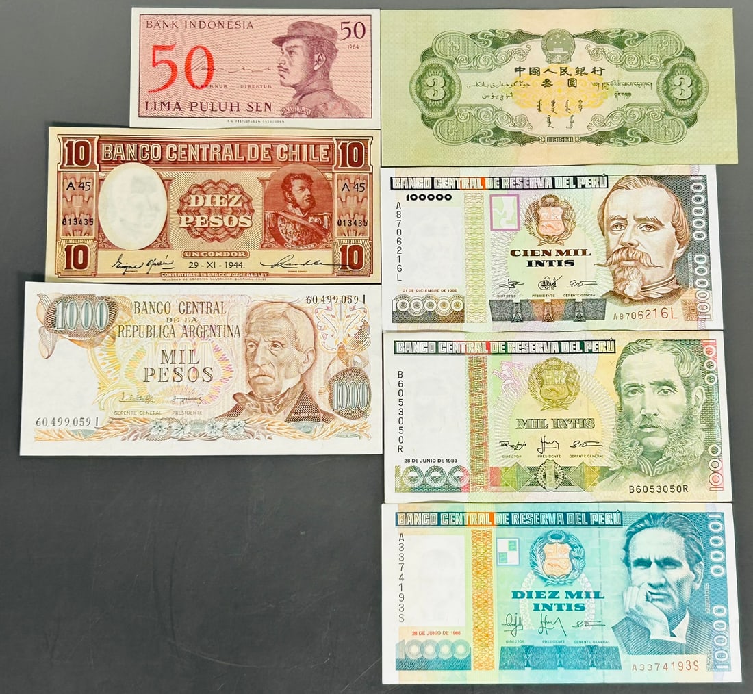 A Group of Seven Banknotes, China, Indonesia, Chile, Peru, and Argentina (1 of 11)