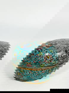 A Chinese Cloisonne Enamel 'Dragon and Phoenix' Circular Box and Cover: Apocryphal Qianlong mark to the bottom. 3.1/8 in. high, 4.3/8 in. diam.