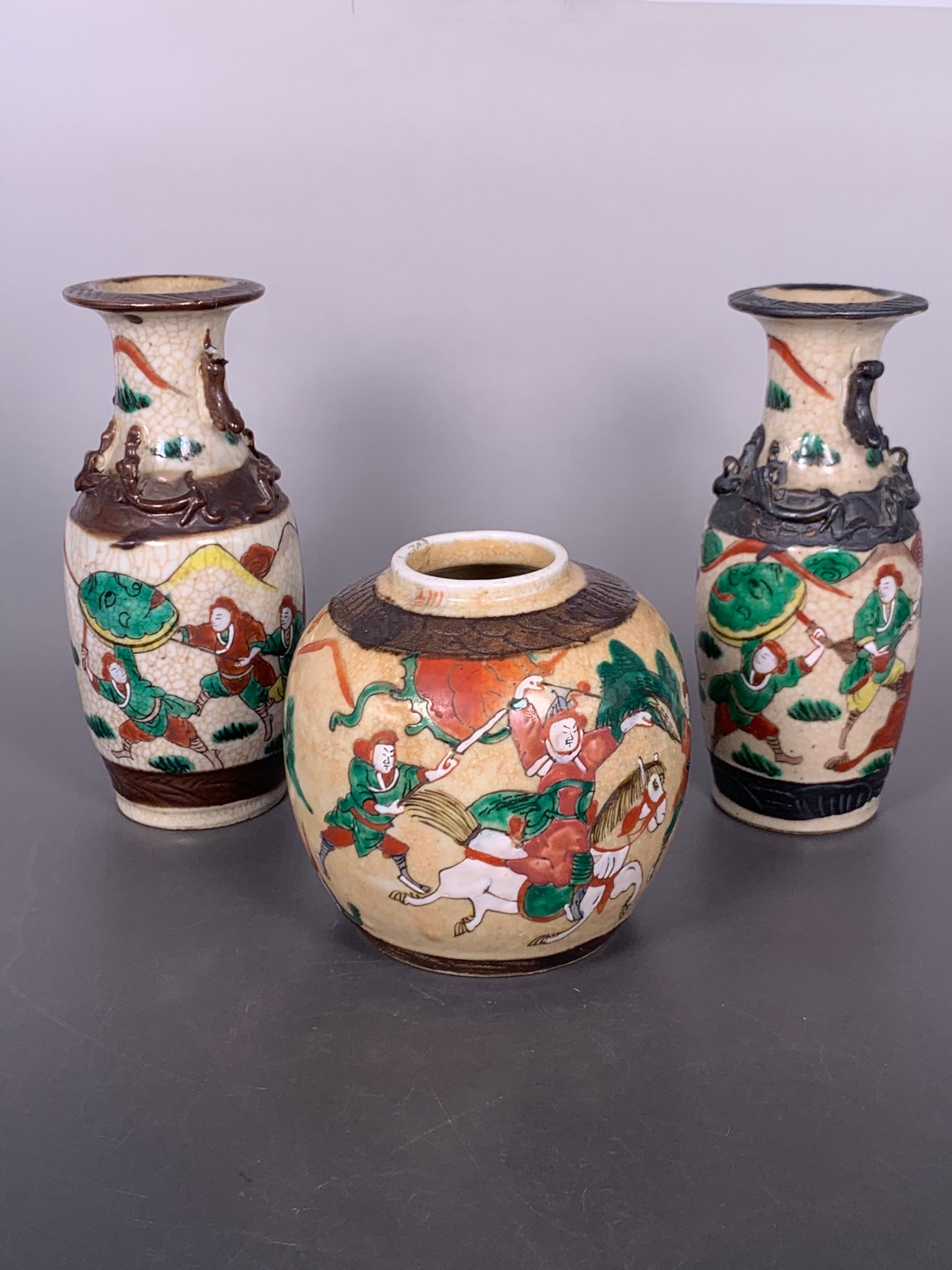 A Group of Three Famille Verte Crackle-Glazed 'Warriors' Porcelain Vessels (1 of 12)