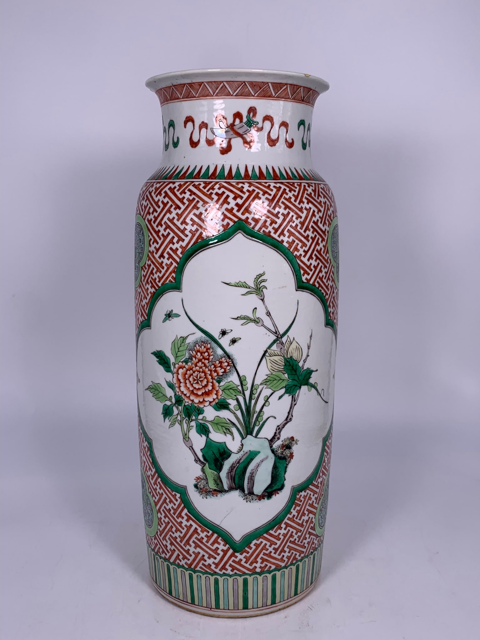 A Chinese Famille Verte 'Medallion' 'Flower' Rouleau Vase, Qing Dynasty: 17.75 in. high, 7.25 in. wide.