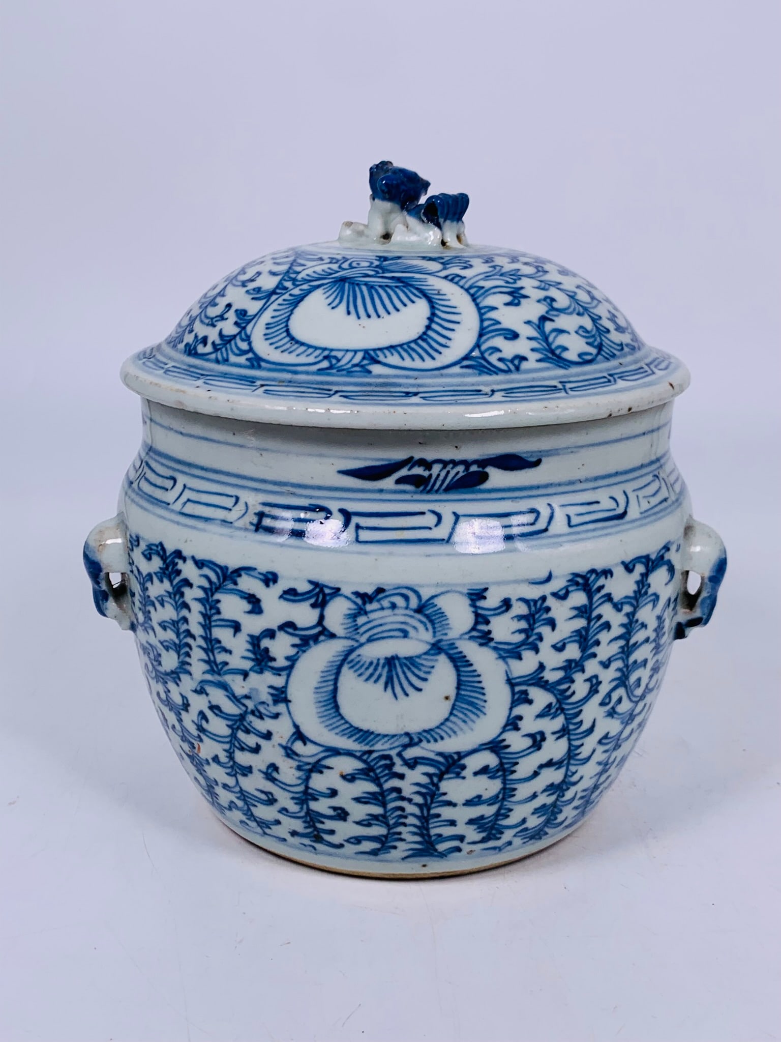A Chinese Blue and White Jar and Cover: 8 in. high, 8 in. wide.