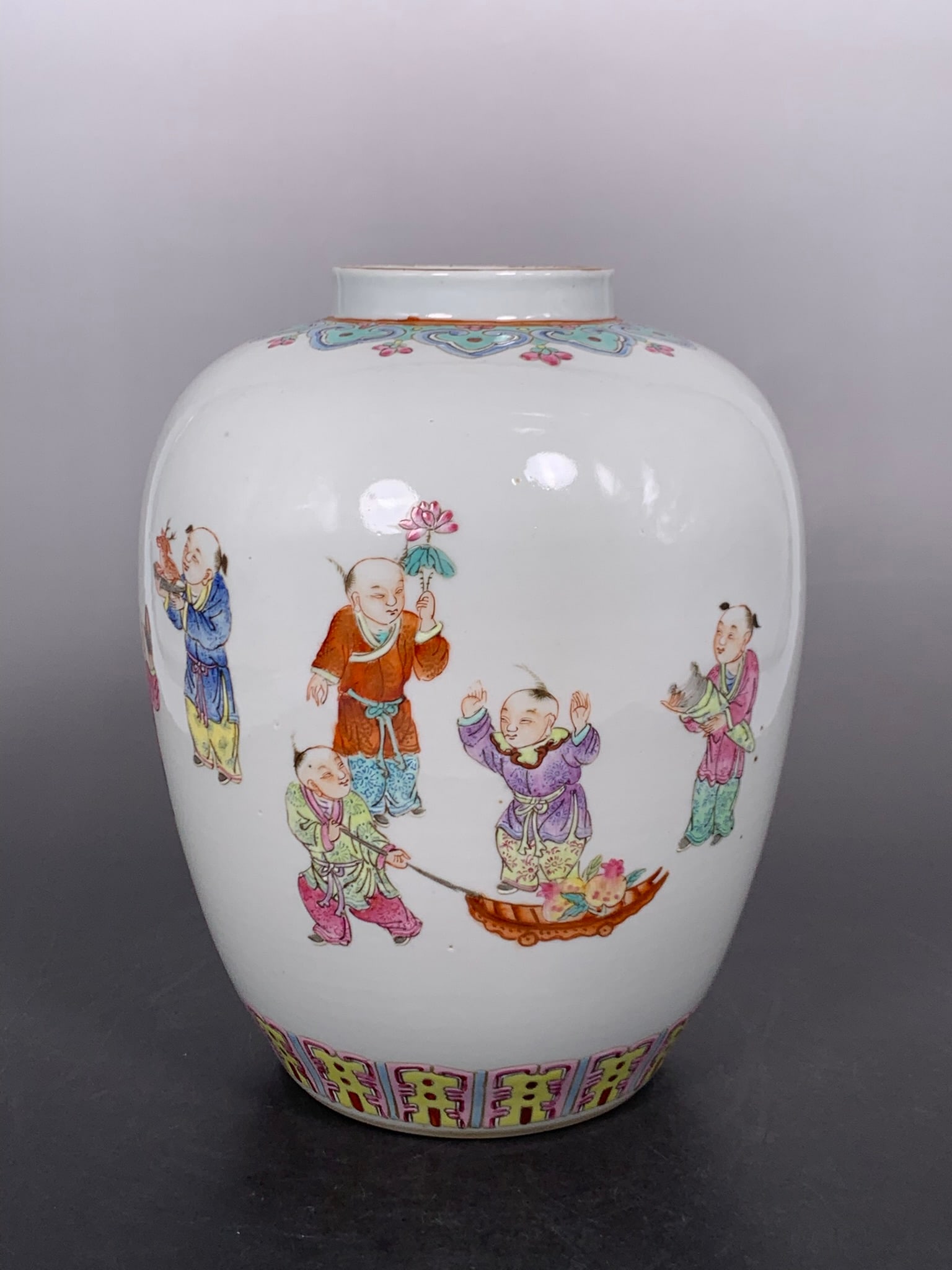 A Chinese Famille Rose 'Hundred Boys' Jar: 8.1/2 in. high, 6.5/8 in. wide.