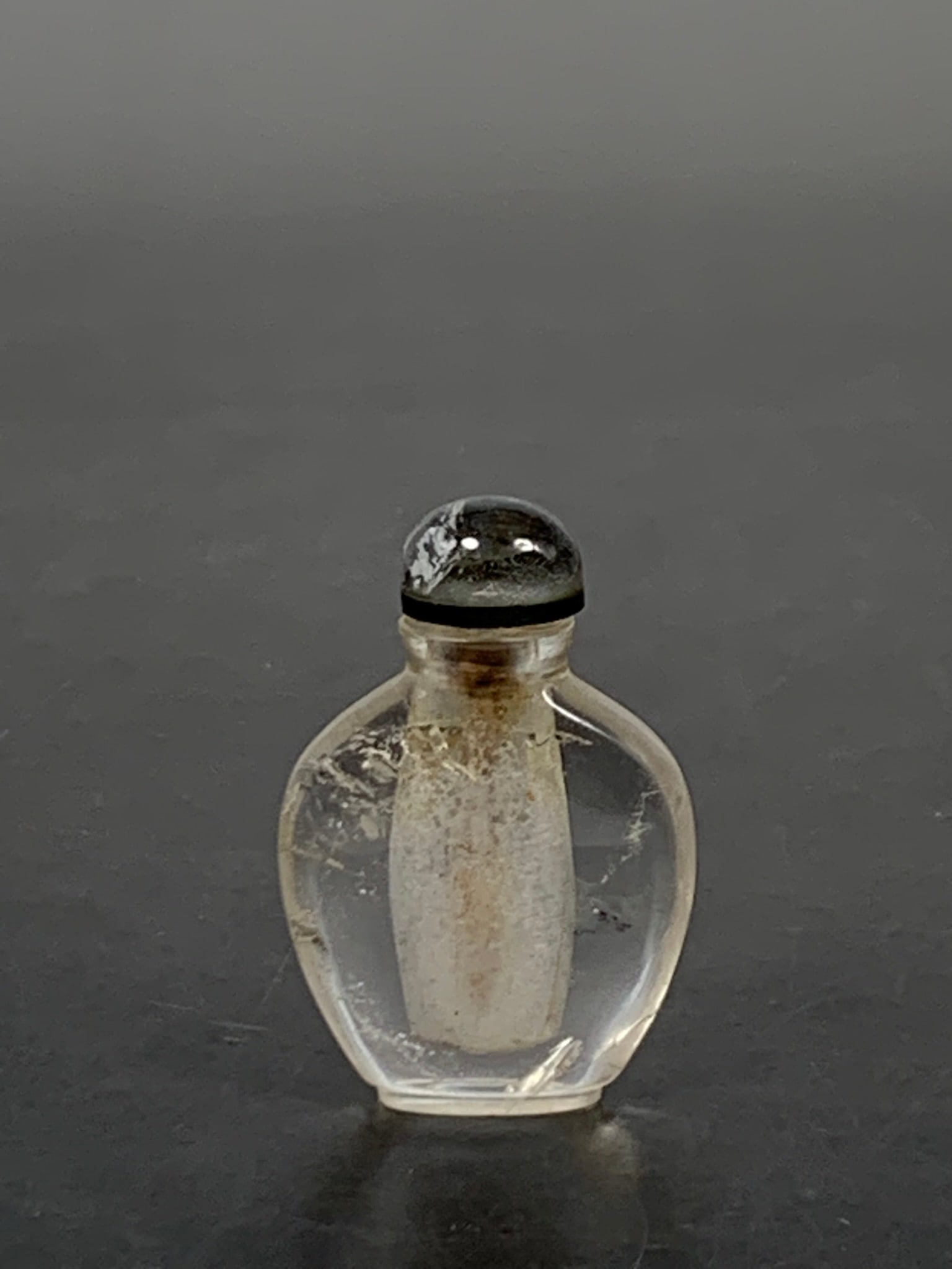 A Chinese Rock Crystal Snuff Bottle: 2 in. high, 1.3/8 in. wide.