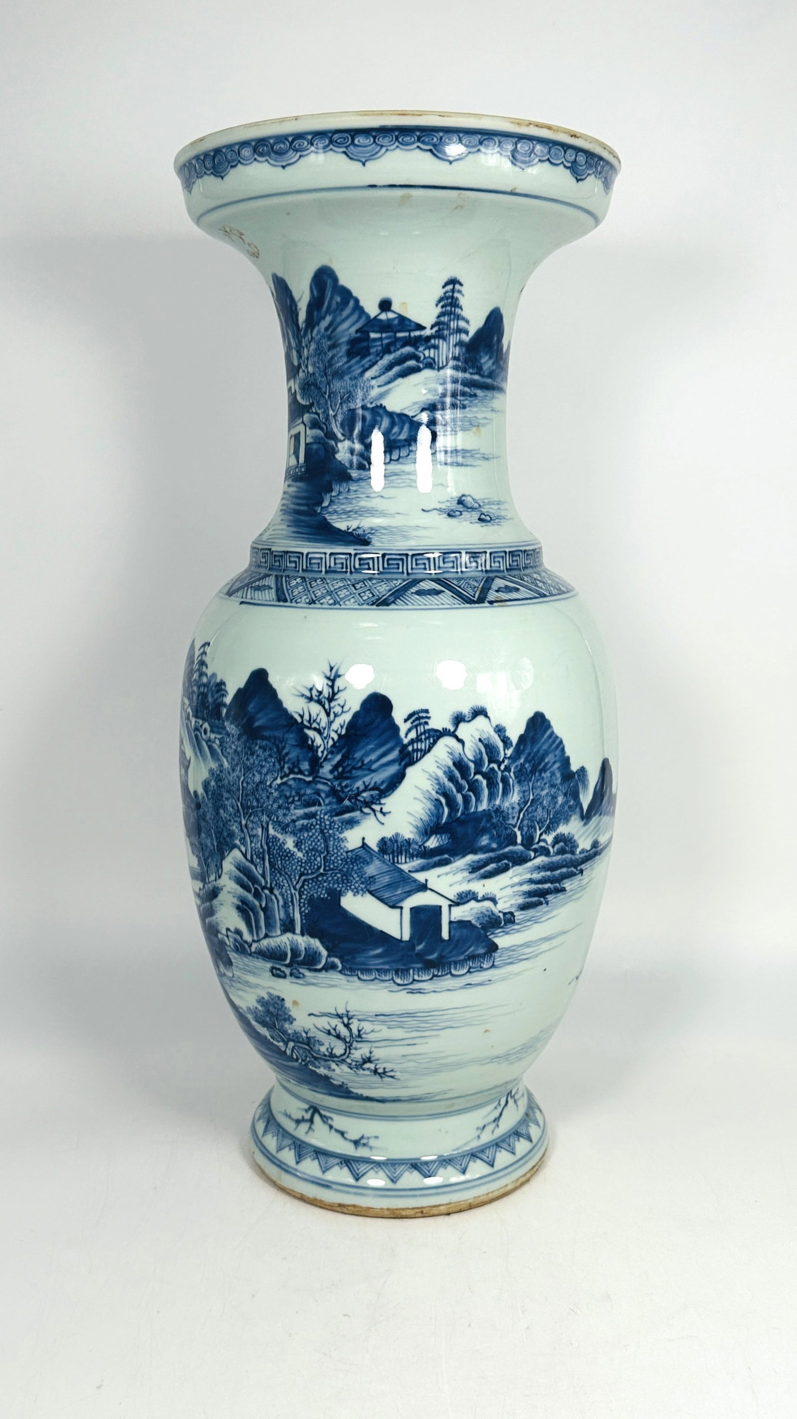 A Large Chinese Blue and White 'Landscape' Vase, Mid-Qing Dynasty: 21.1/8 in. high, 9 in. wide.