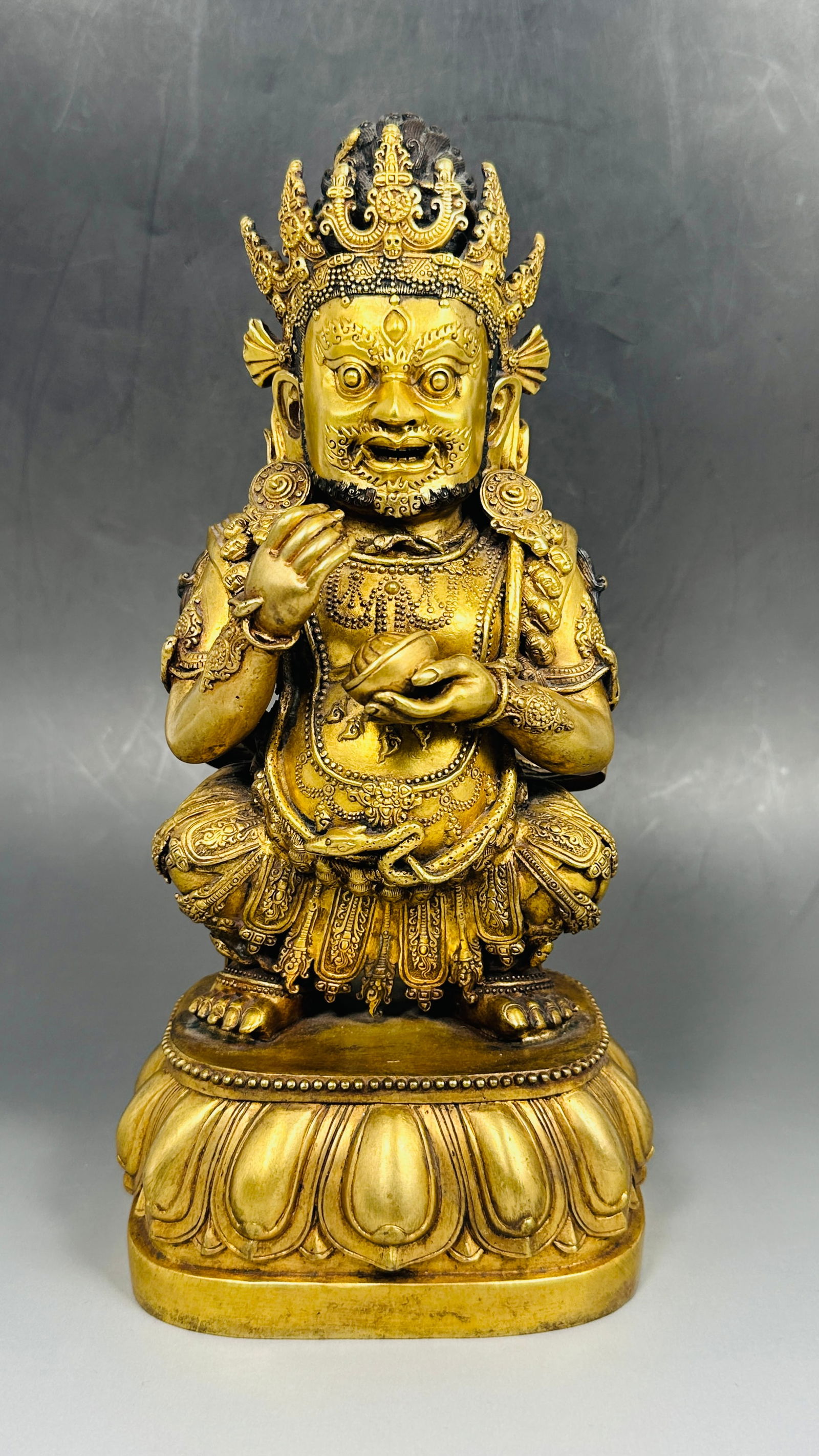 A Gilt-Bronze Figure of Mahakala: 11.3/8 in. high, 5.3/8 in. wide.