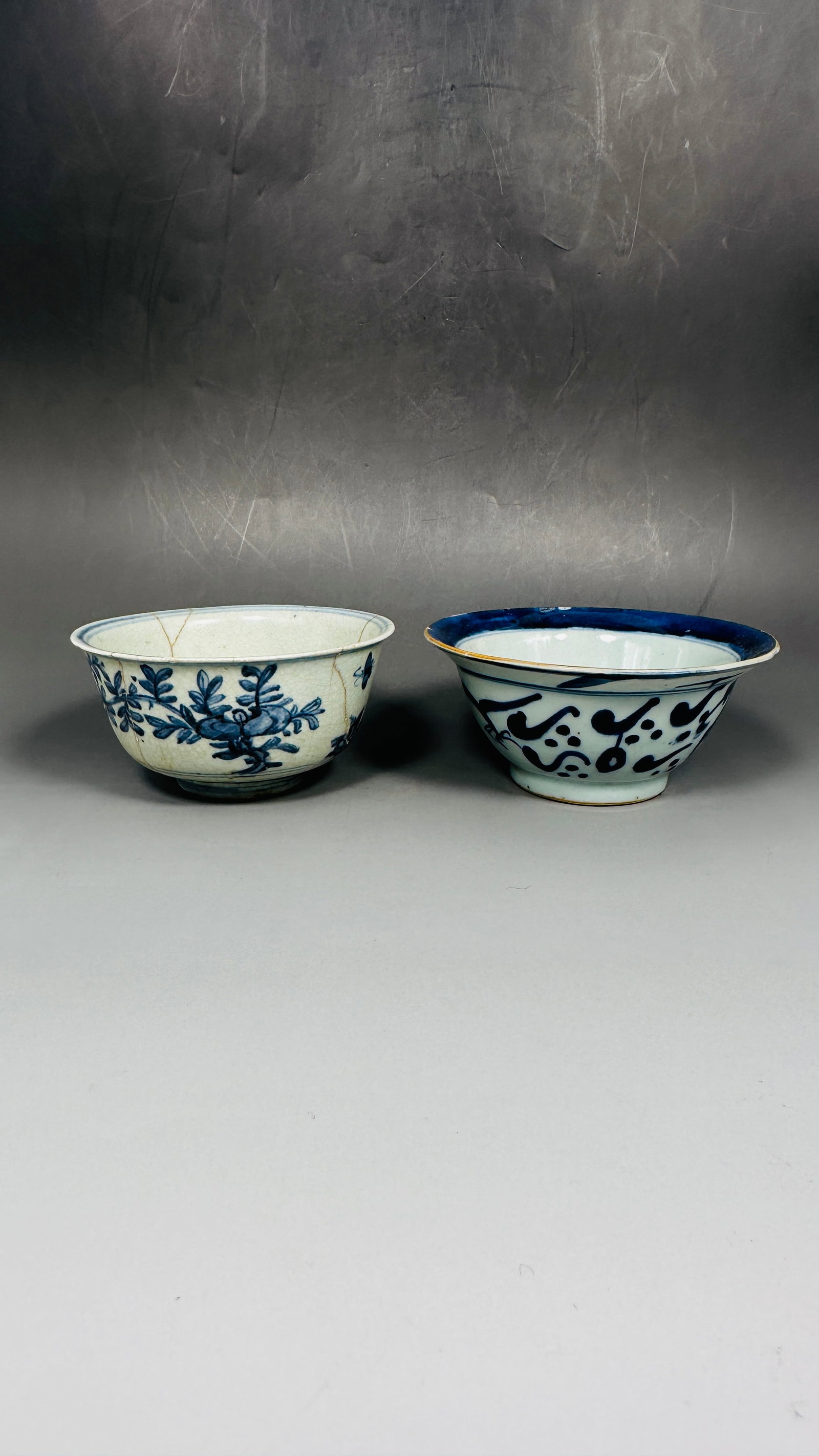 Two Chinese Blue and White Bowls, Late Ming Dynasty and Kangxi Period, Qing Dynasty: The late Ming bowl measures 2.1/2 in. high, 5.1/8 in. diam.; the Kangxi bowl measures 2.3/8 in. high, 5.1/2 in. diam.