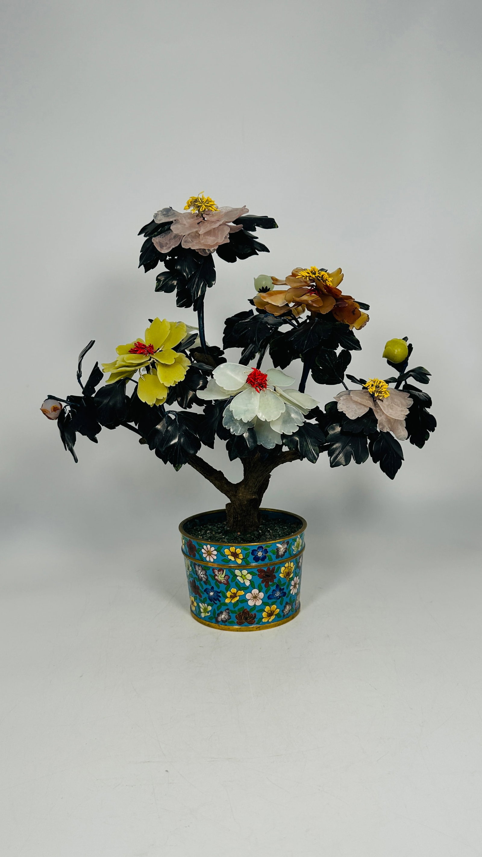 A Chinese Hardstone-Decorated Bonsai with Cloisonne Enamel Jardiniere: 17 in. high, 15.1/2 in. wide.