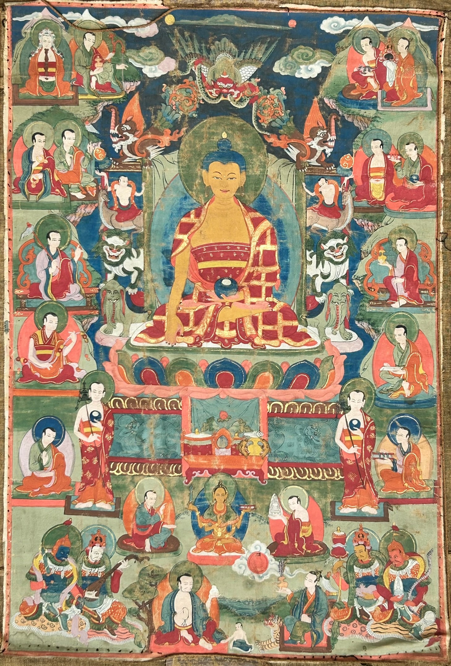 A Tibetan Painting of Shakyamuni Buddha, Thangka: Cloth mount, 24.1/2 in. x 17 in. for the painting; 40 in. x 21 in. overall.