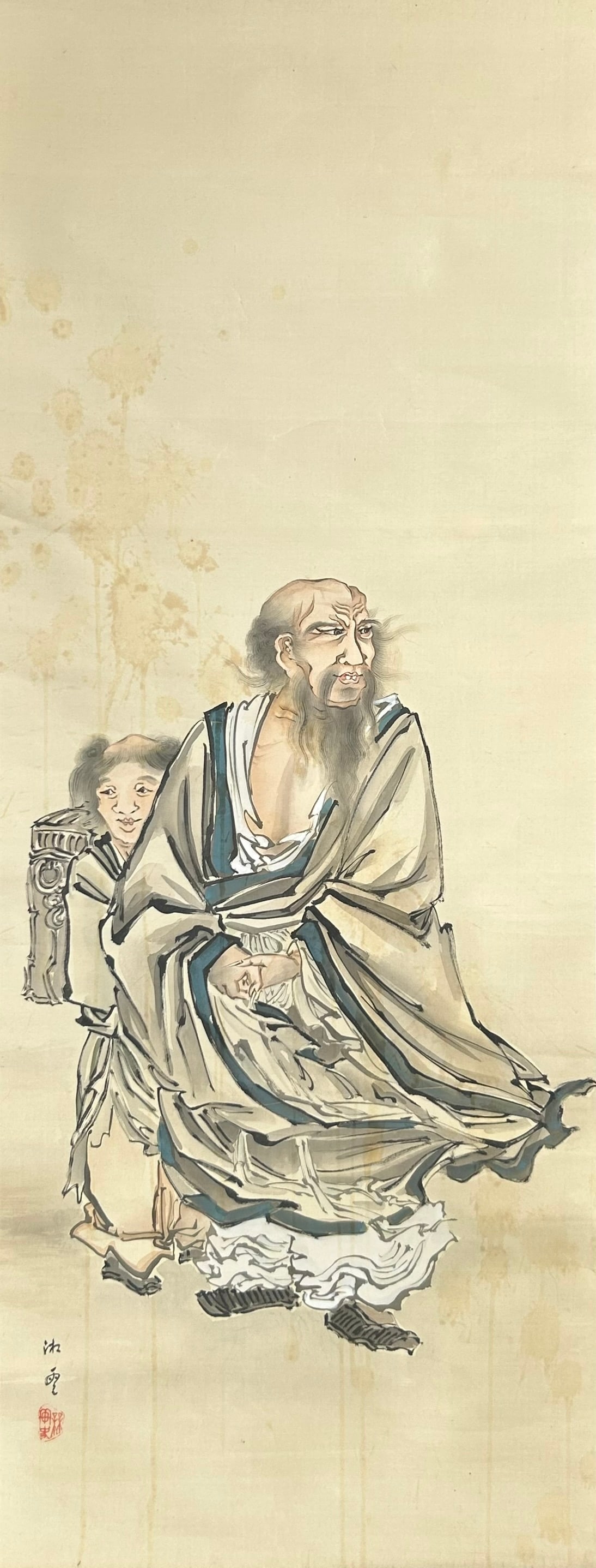 A Chinese Painting of Bodhidharma and Attendant: Mounted as a hanging scroll, ink and color on silk. 70 in. x 21 in. overall including the mounting paper.