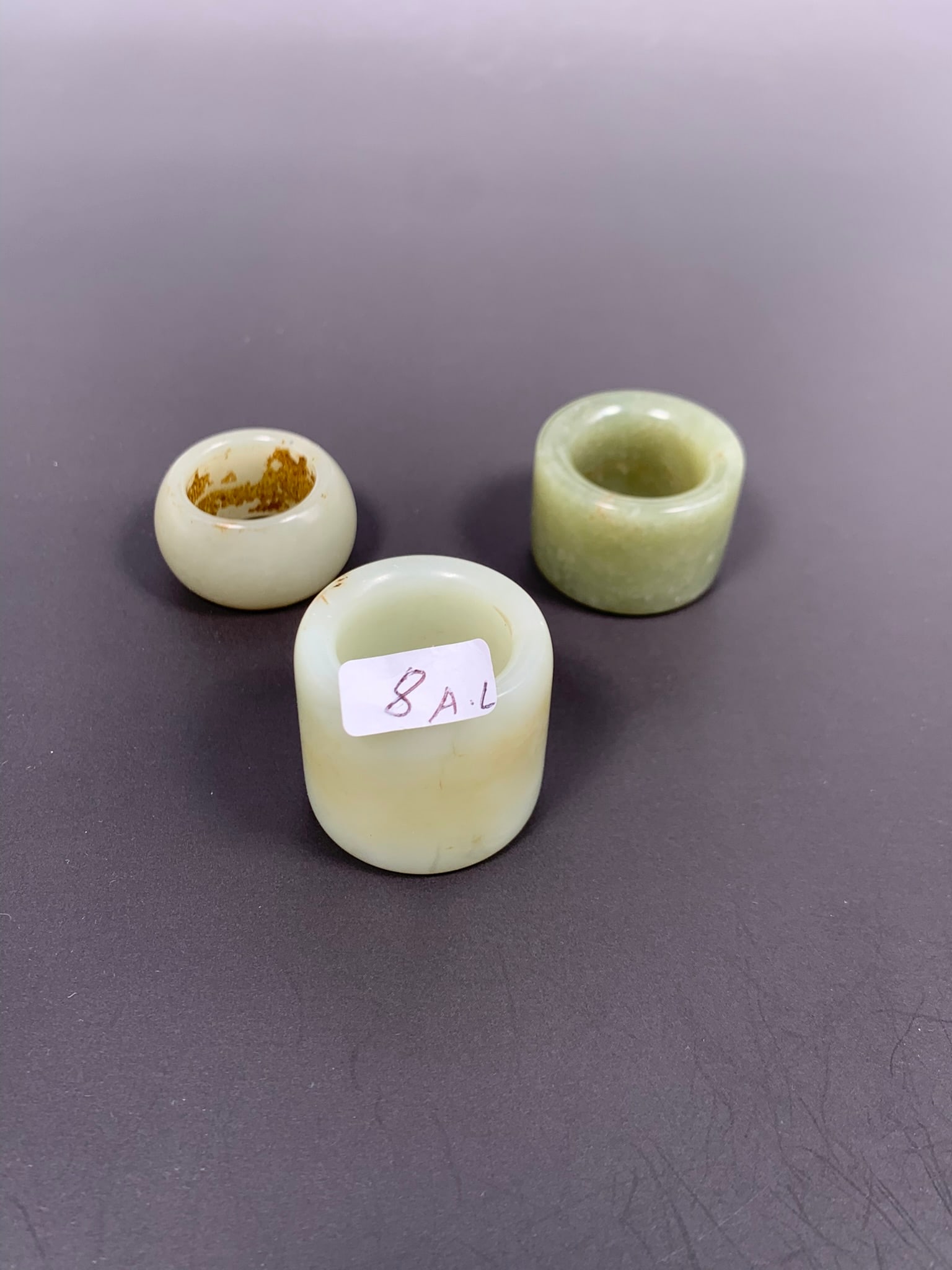A Group of Three Chinese Jade Thumb Rings (1 of 11)
