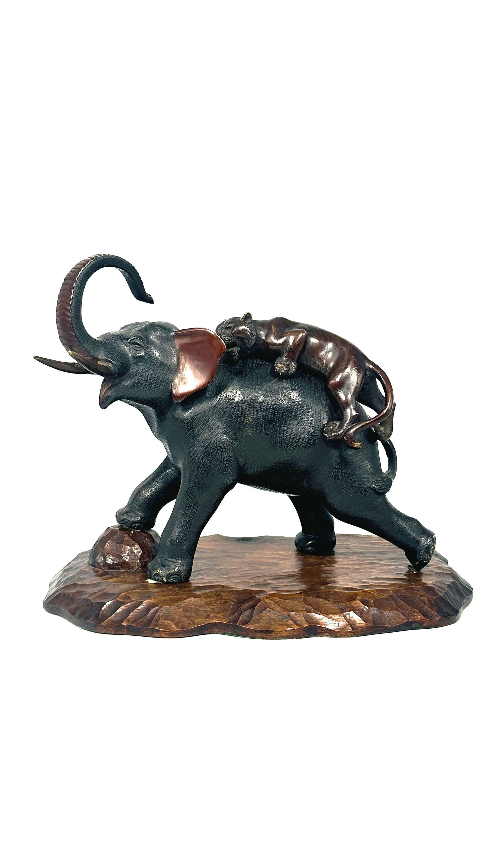 A Japanese Antique Bronze Sculpture of Elephant and Tiger: With a wood base. 12.1/2 in. high, 16 in. wide.