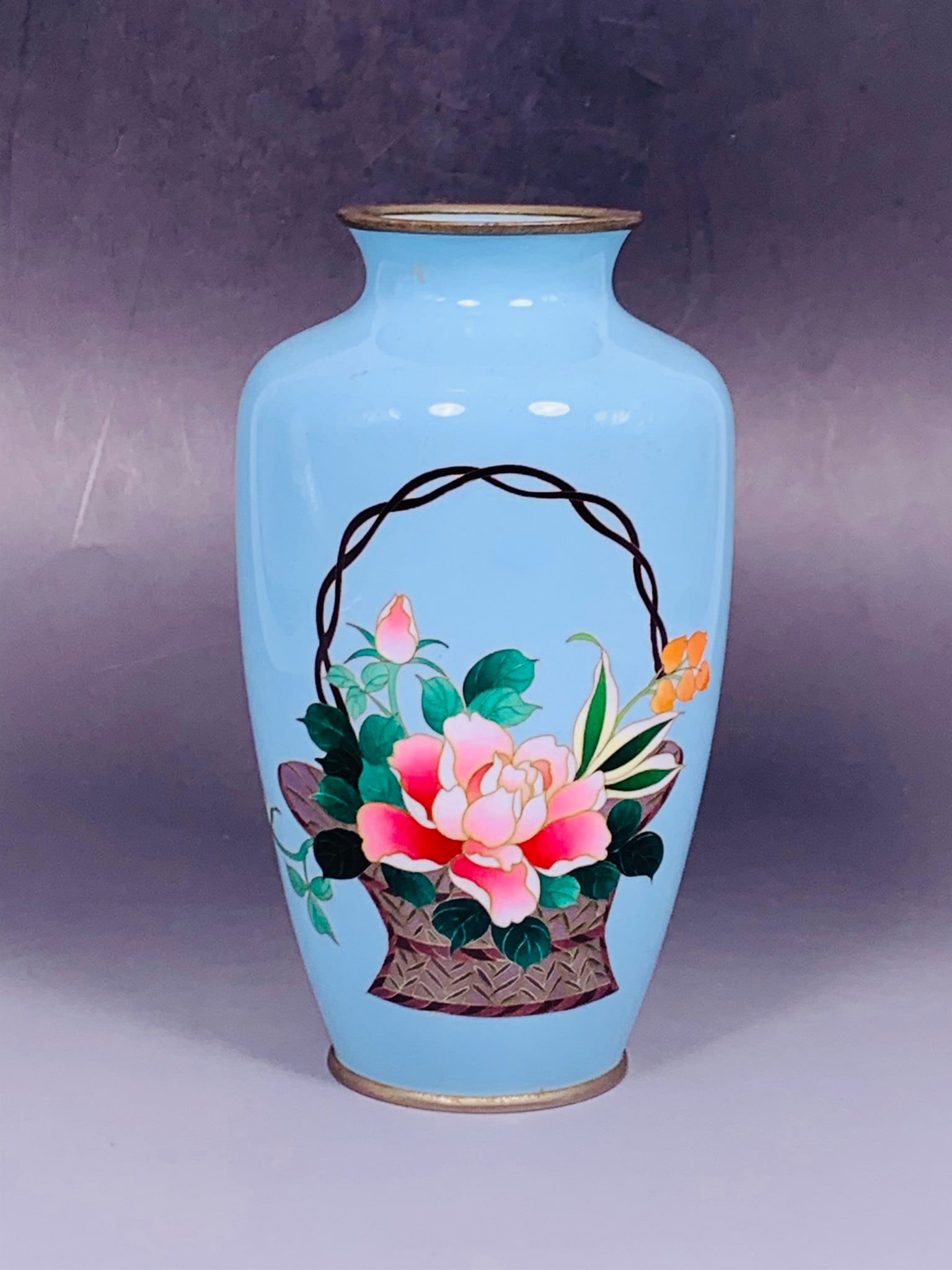 A Japanese Cloisonne Enamel 'Flower Basket' Vase, Sato Company Mark: Signed and stamped by the Sato company on the bottom rim. 7.1/8 in. high, 4 in. wide.