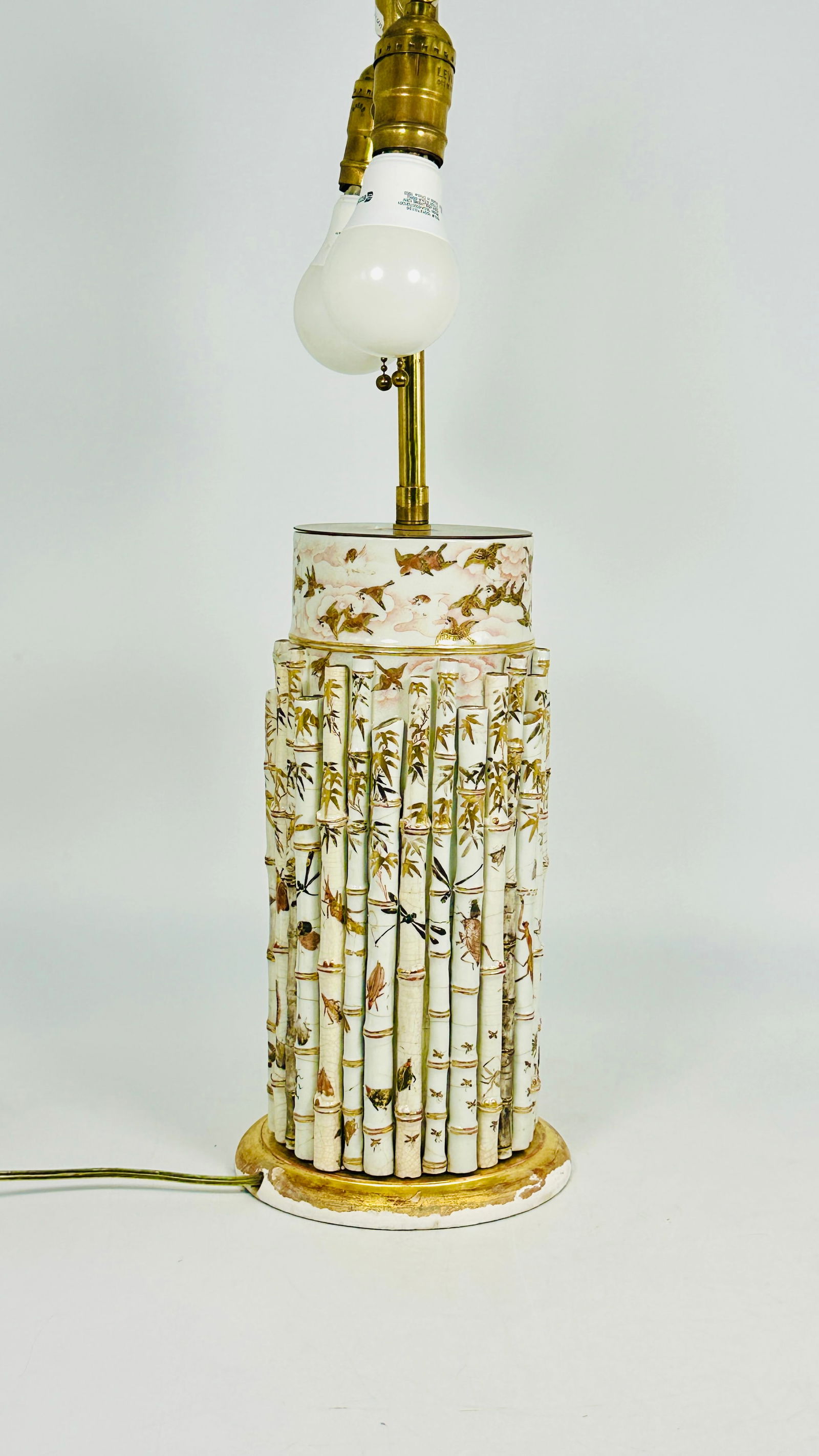 A Japanese Kutani Gilt-Decorated ?Bamboo? Cylindrical Vase: Mounted as a lamp, an illegible maker's mark contains 'Kutani Dai Nippon Ishikawa' to the base. 23 in. high, 6.1/2 in. wide.