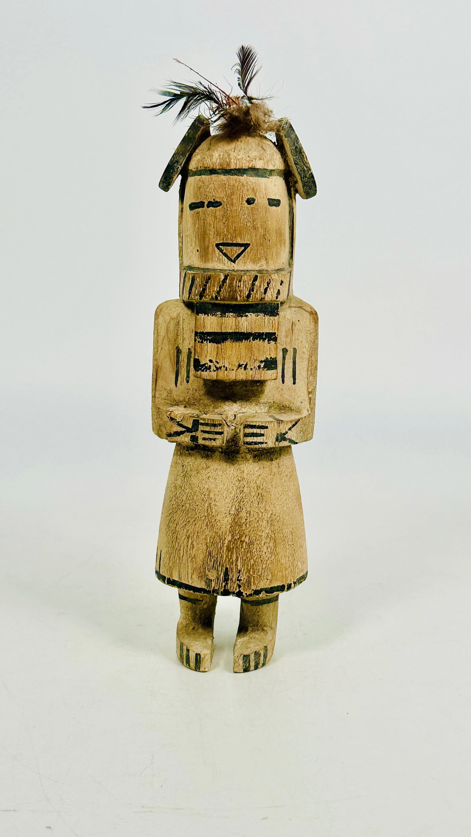 A Kachina Doll Figure: 6 in. long, 3 in. wide.