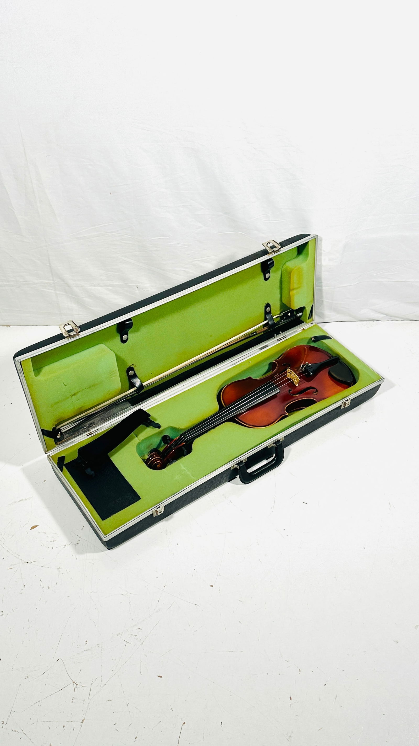 A Vintage Alfred Zapf Reproduction of Antonius Stradivarius Violin: With a rectangular carrying case, the violin measures 23 in. long, 8 in. wide; the case measures 4.1/2 in. high, 31.1/2 in. wide, 10 in. deep.
