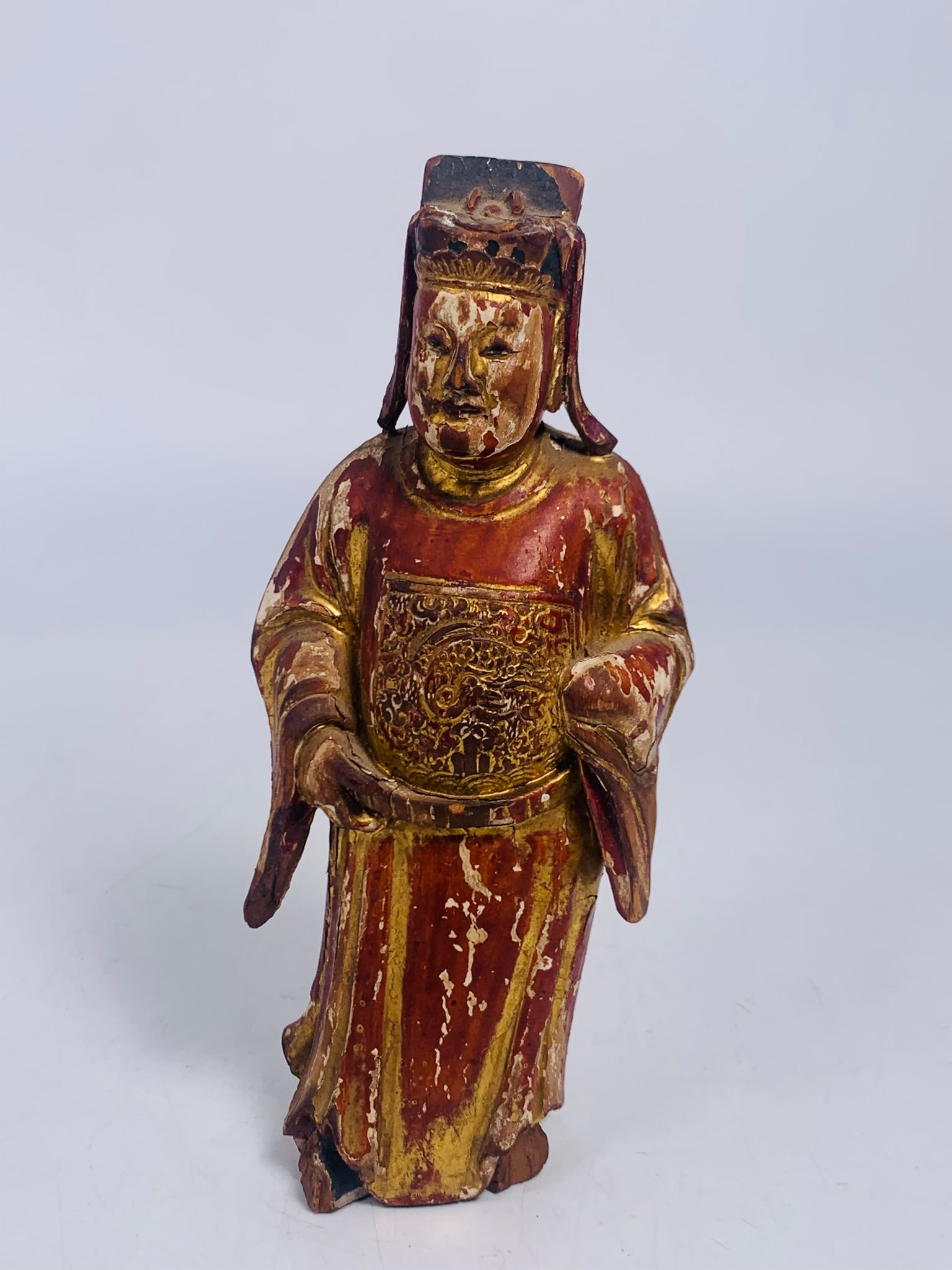 A Chinese Painted and Gilt-Decorated Carved Wood Figure of Official, Ming Dynasty (1 of 9)