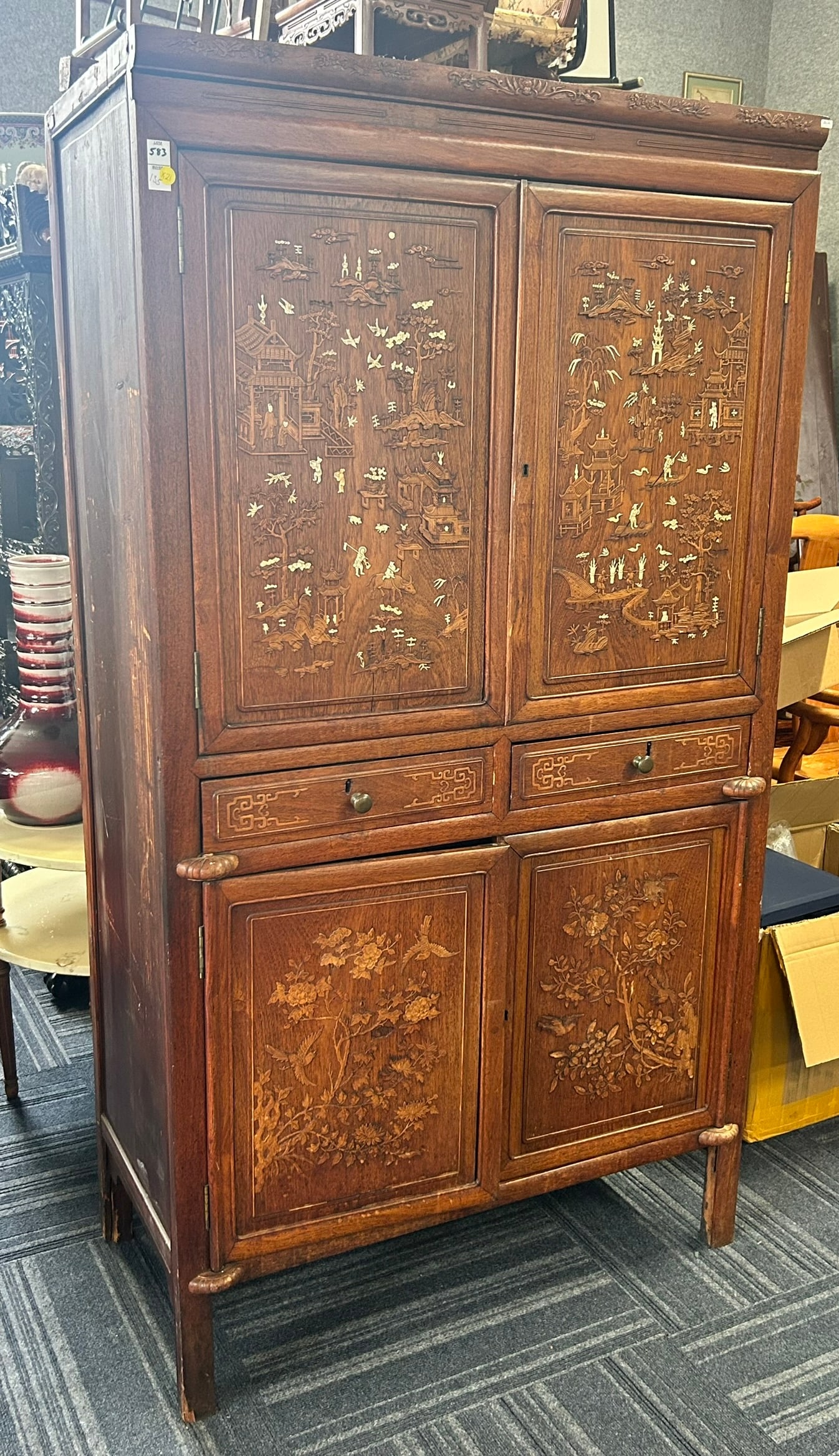 A Vintage Chinoiserie Carved and Bone-Inset Armoire Cabinet: 70 in. high, 38.1/2 in. wide, 19 in. deep.