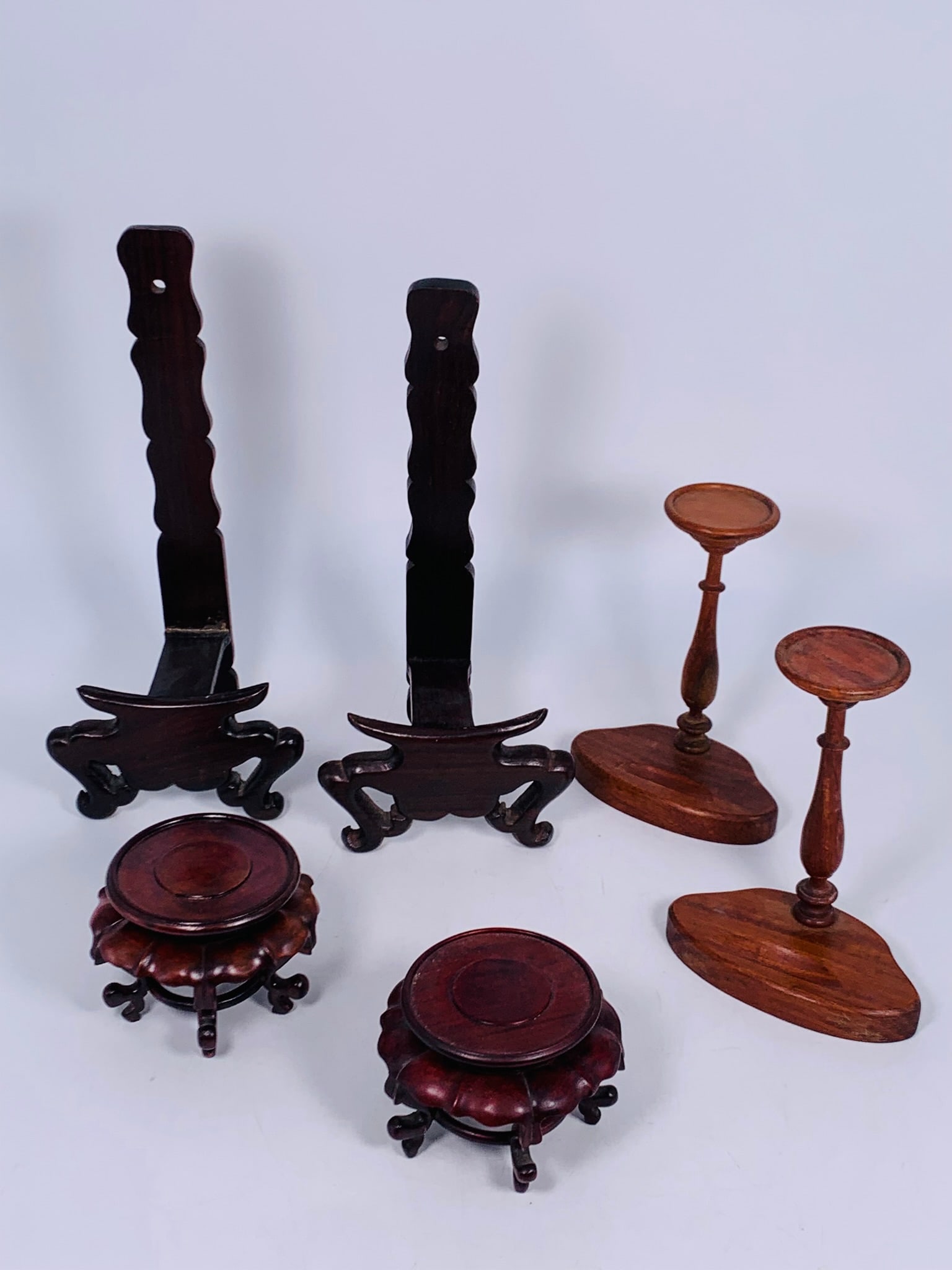A Group of Six Chinese Wood Stands and Racks: Wood stands and dish racks in various sizes, the largest measures 11.1/2 in. high, 5.1/4 in. wide.