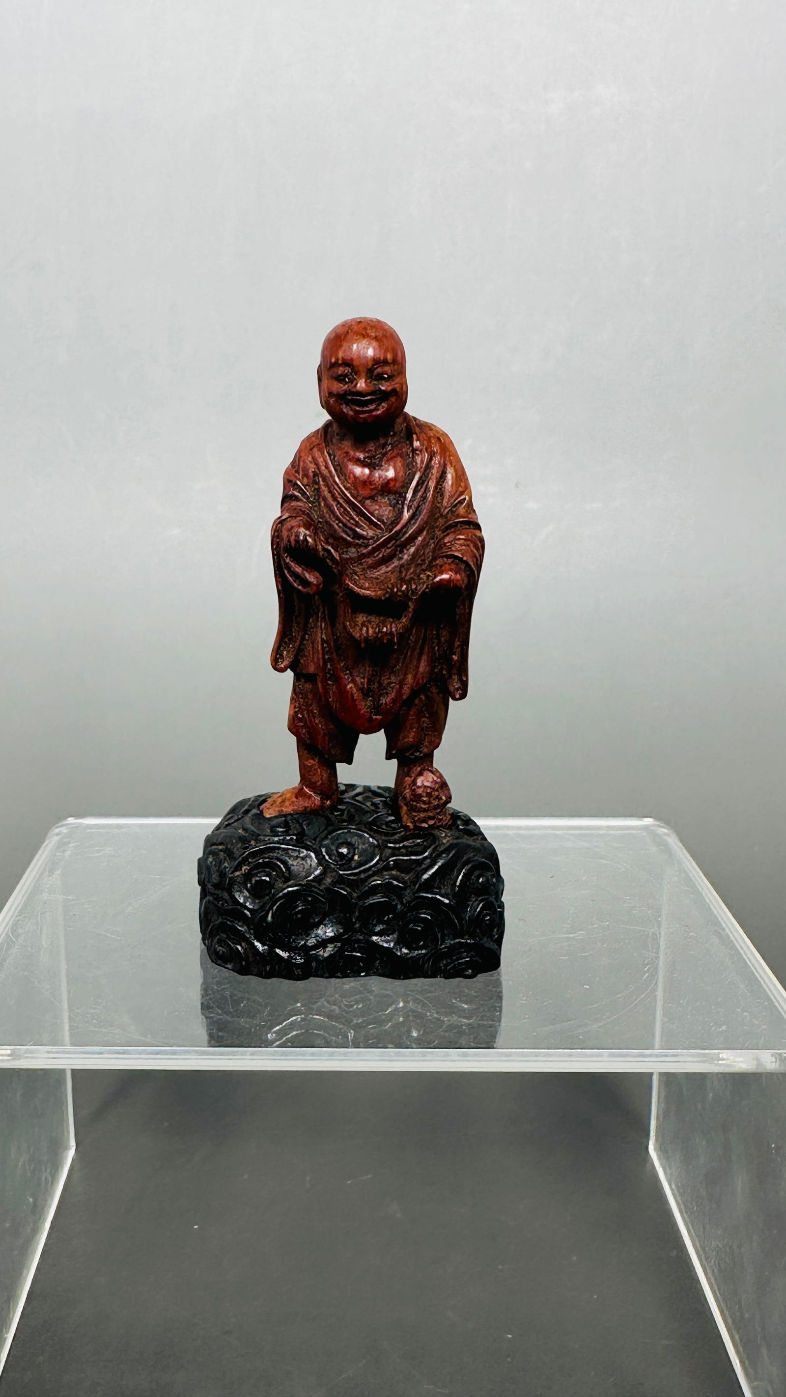 A Chinese Small Carved Bamboo Figure of Luohan (1 of 9)