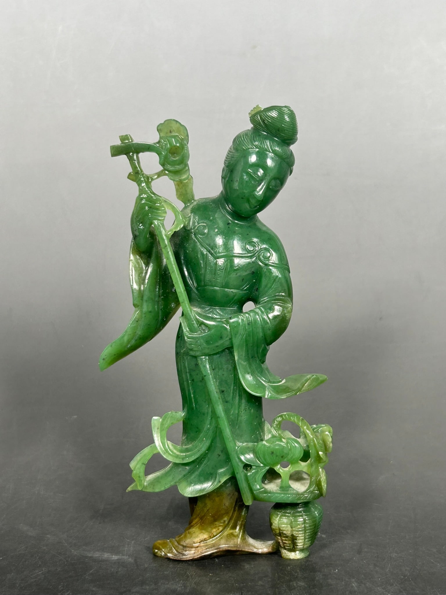 A Chinese Carved Jade Figure of Court Lady: 6.1/2 in. high, 3.1/4 in. wide.