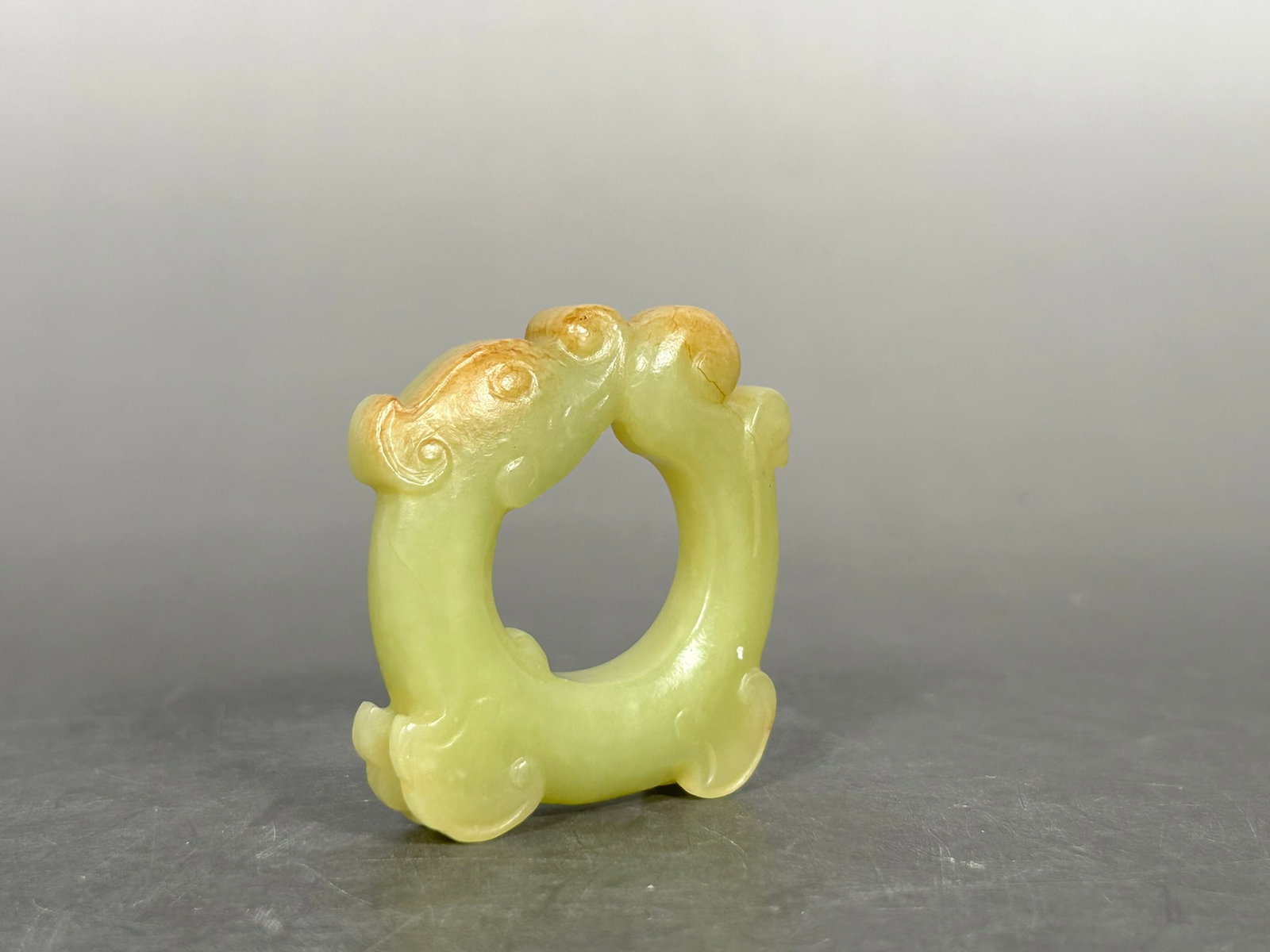 A Chinese Yellow Jade Carving of a Dragon, Second Century BC: 2 in. long, 1.7/8 in. wide.