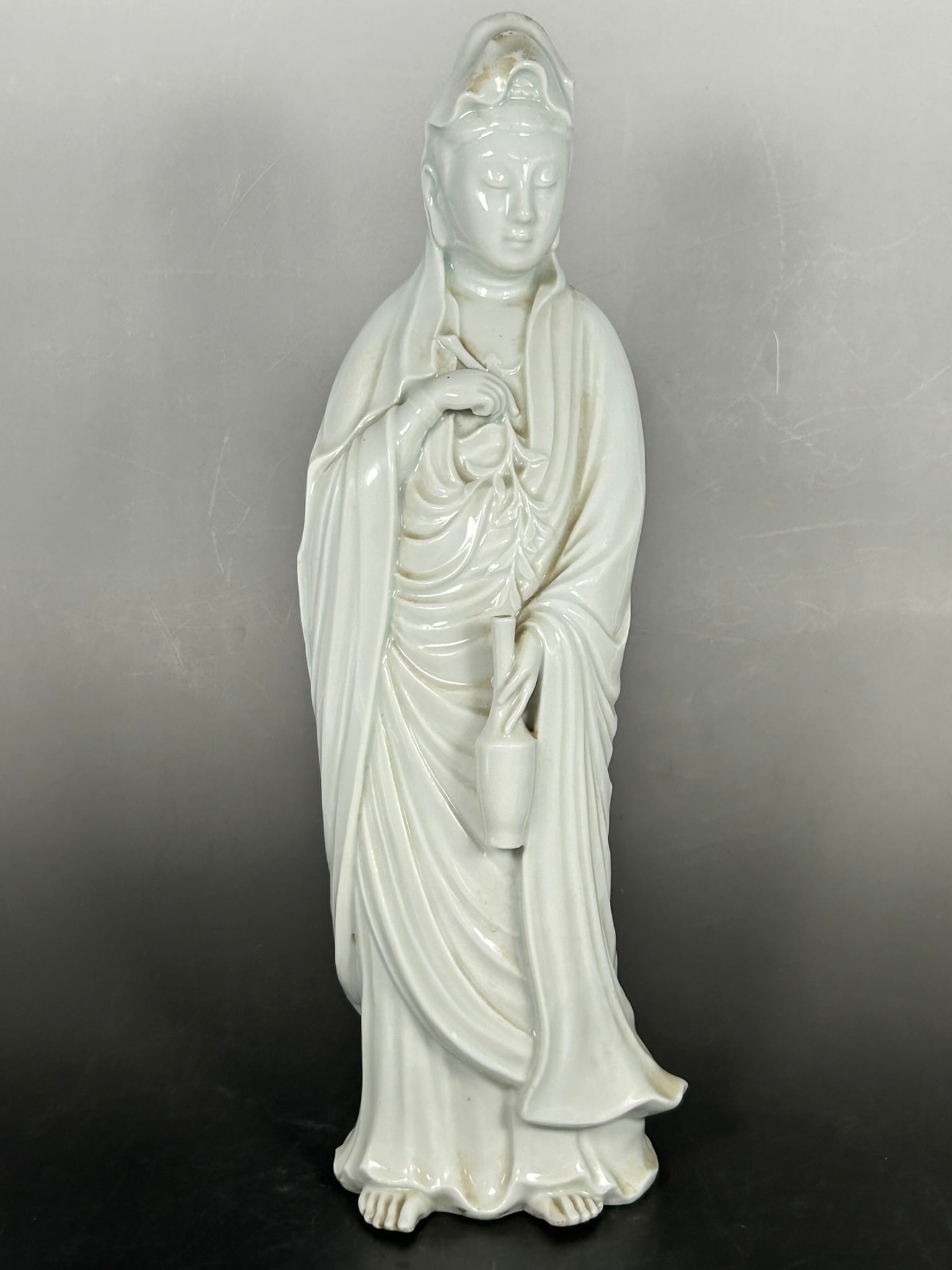 A Chinese Dehua Figure of Standing Guanyin: 16.1/4 in. high, 5 in. wide.