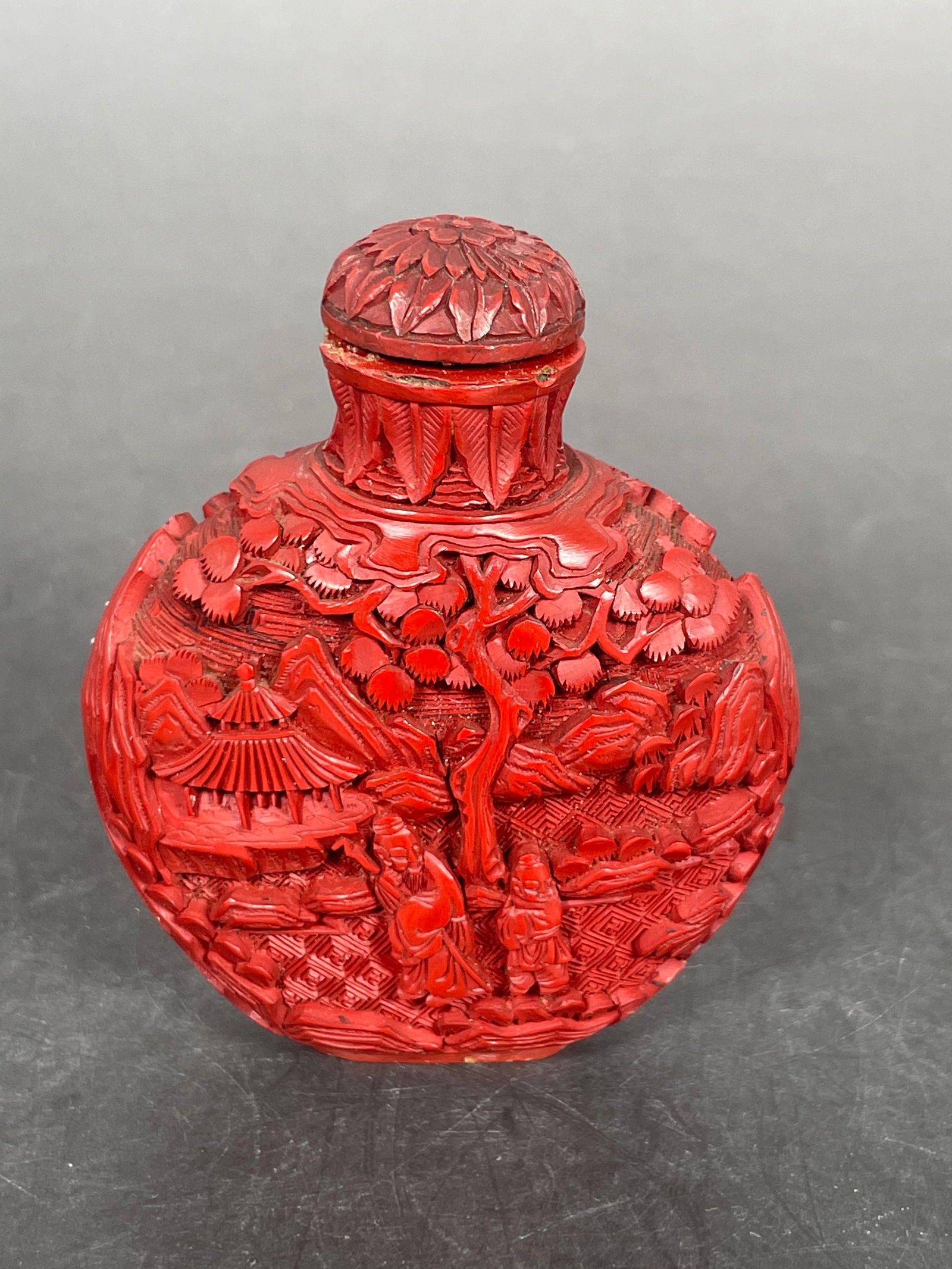 A Chinese Carved Red Lacquer 'Figural' Snuff Bottle (1 of 10)