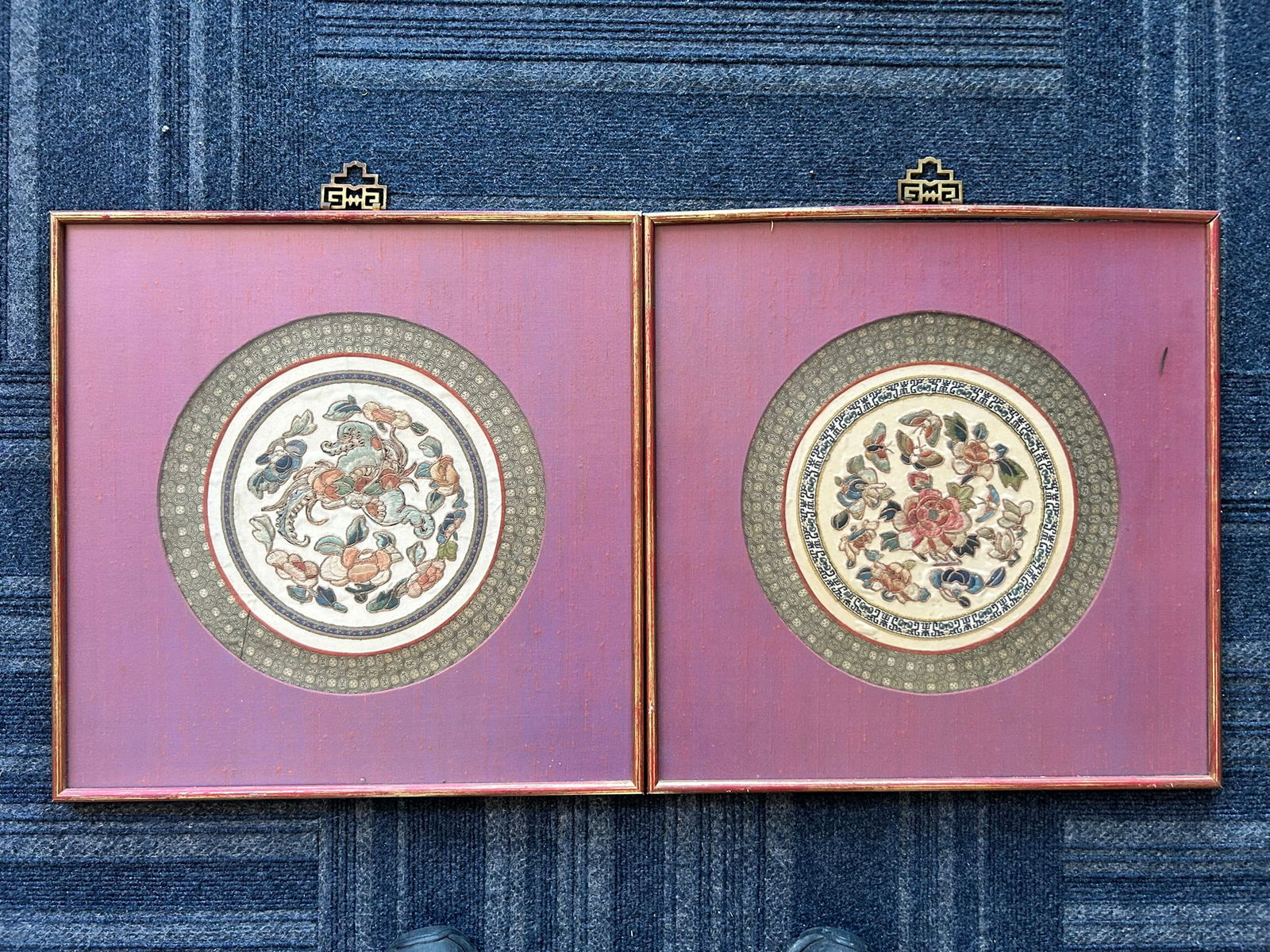 A Pair of Chinese Embroidered Silk Roundels: Both are framed, 12 in. diam. each (sight), 18.1/2 in. square each (frame).