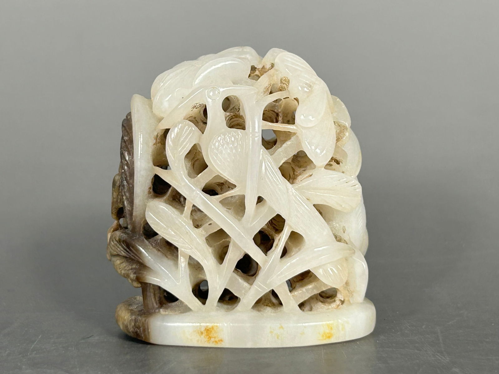 A Chinese White and Russet Jade 'Deer and Crane' Hat Finial (1 of 8)