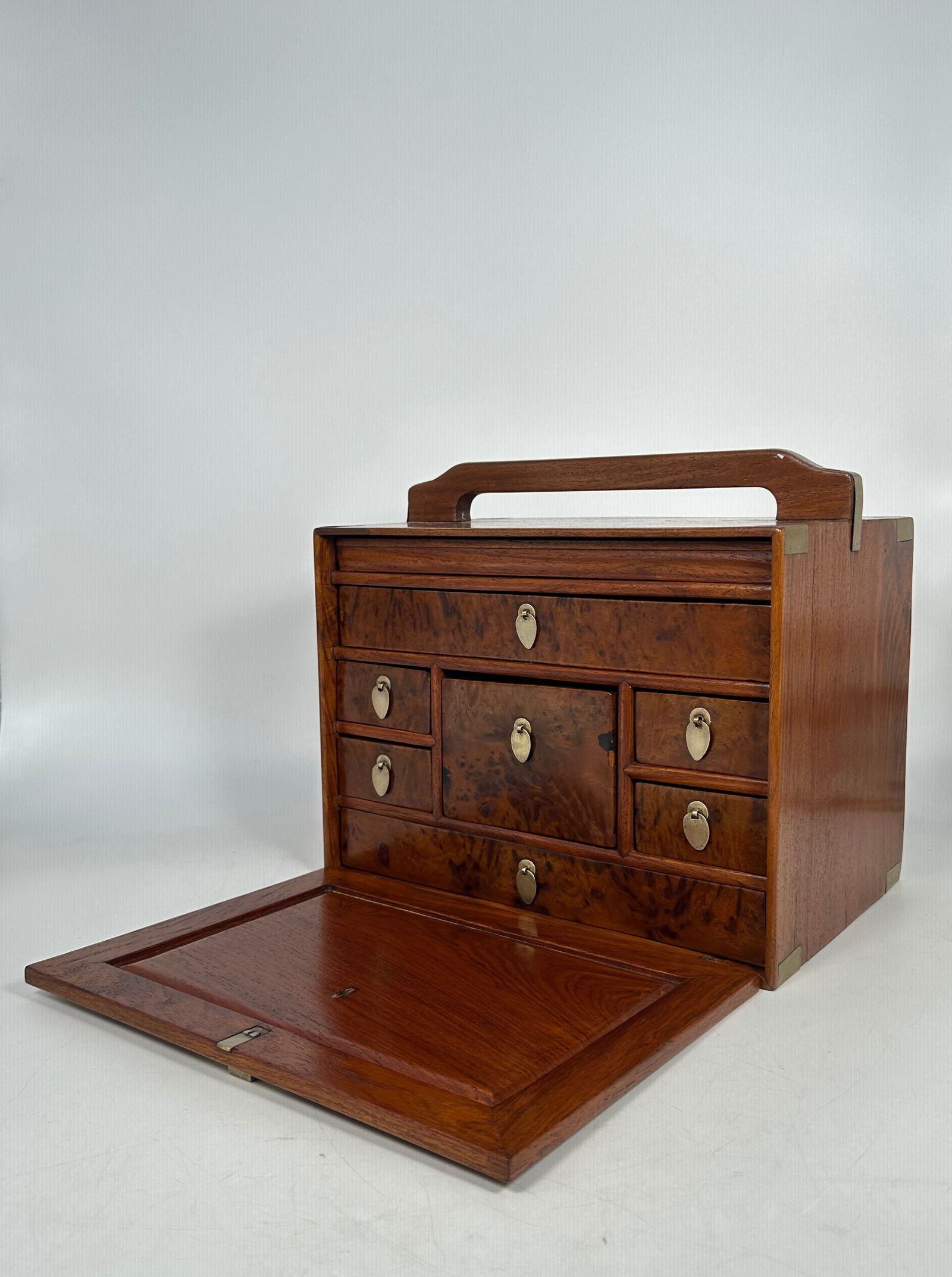 A Chinese Huanghuali Box: 10.1/2 in. high, 12 in. wide, 8.1/4 in. deep.