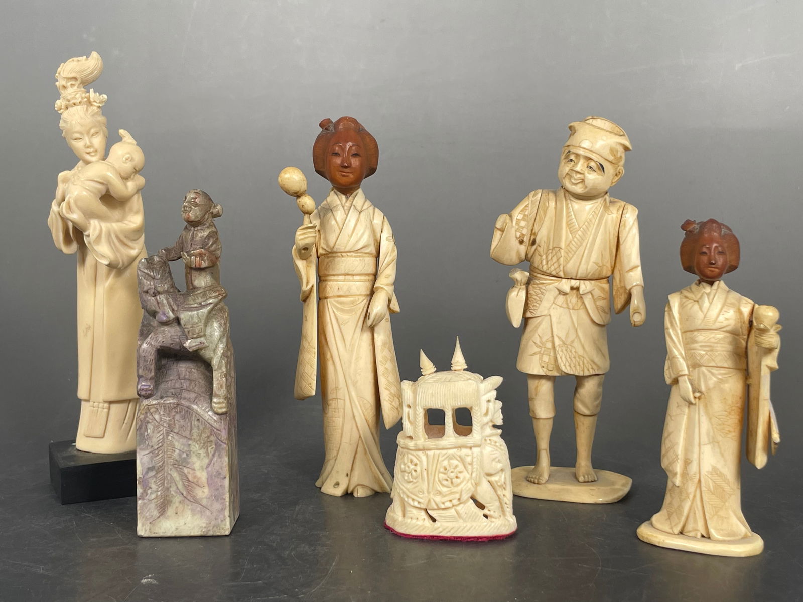 A Group of Five Carved Bone Figures and a Stone Seal (1 of 20)