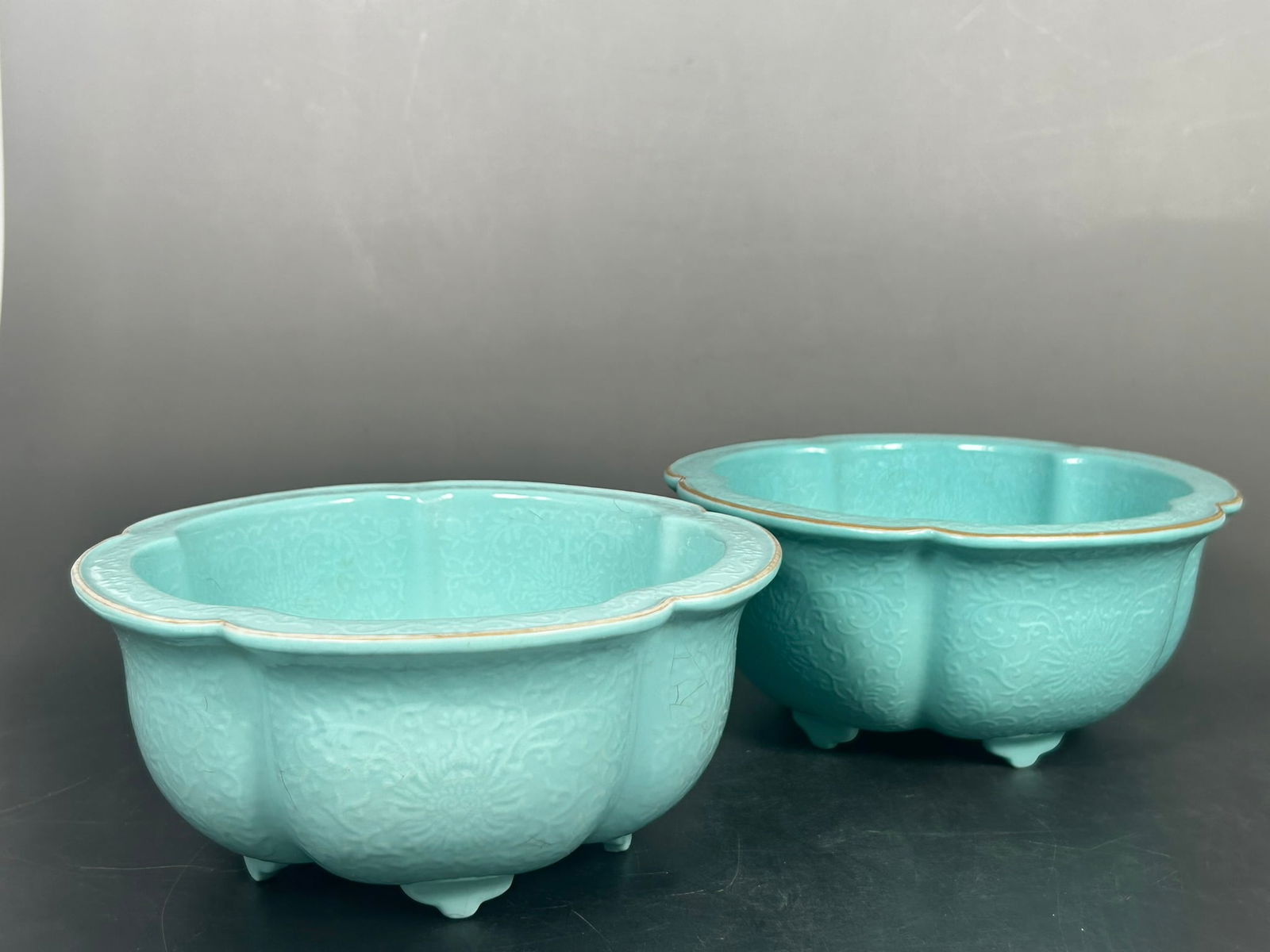 A Pair of Chinese Turquoise-Glazed Lobed 'Lotus' Jardinieres, Shen De Tang Marks: 3.1/8 in. high, 7 in. wide each.
