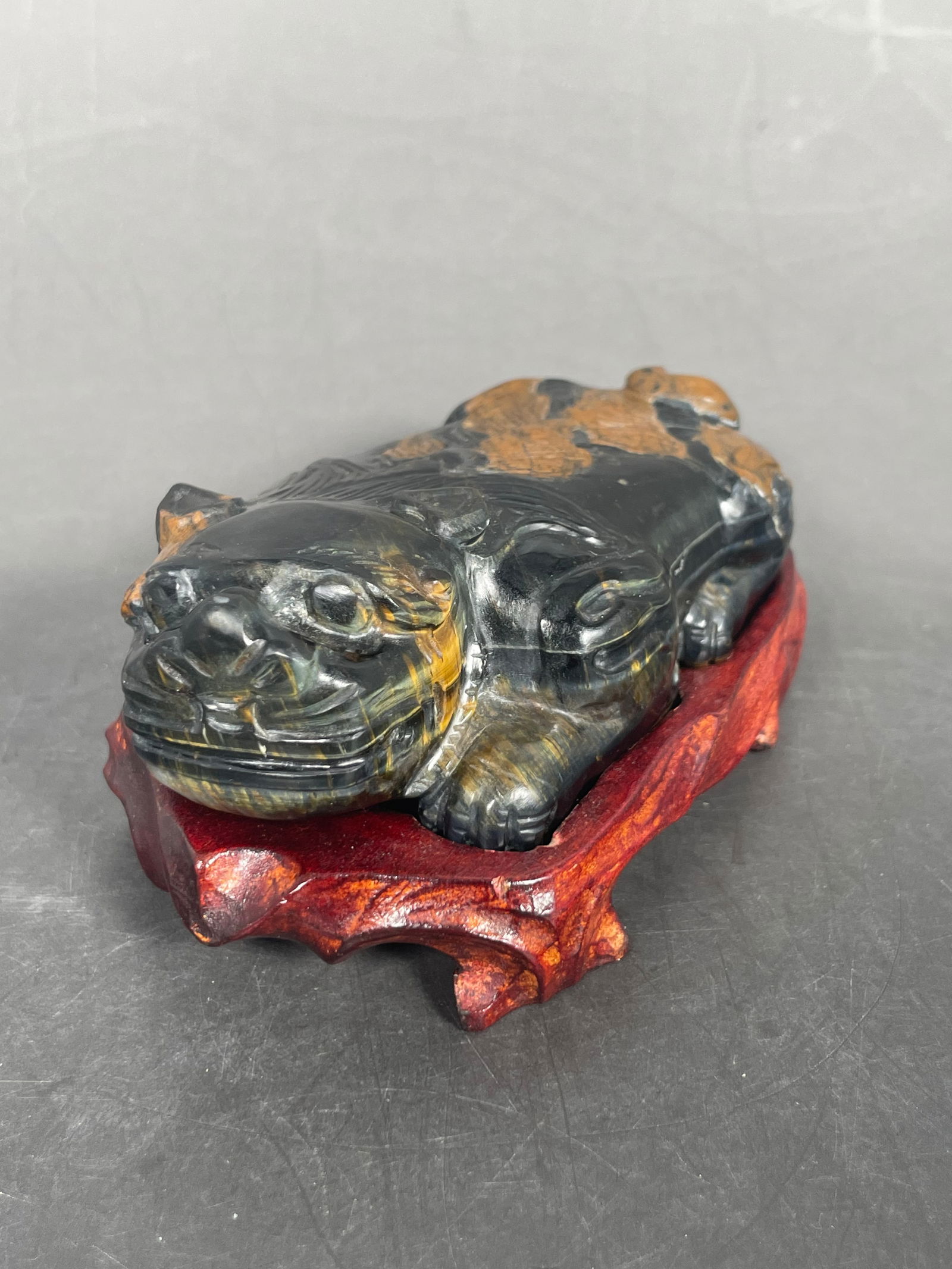 A Chinese Tiger's Eye Carving of a Crouching Mythical Animal (1 of 8)