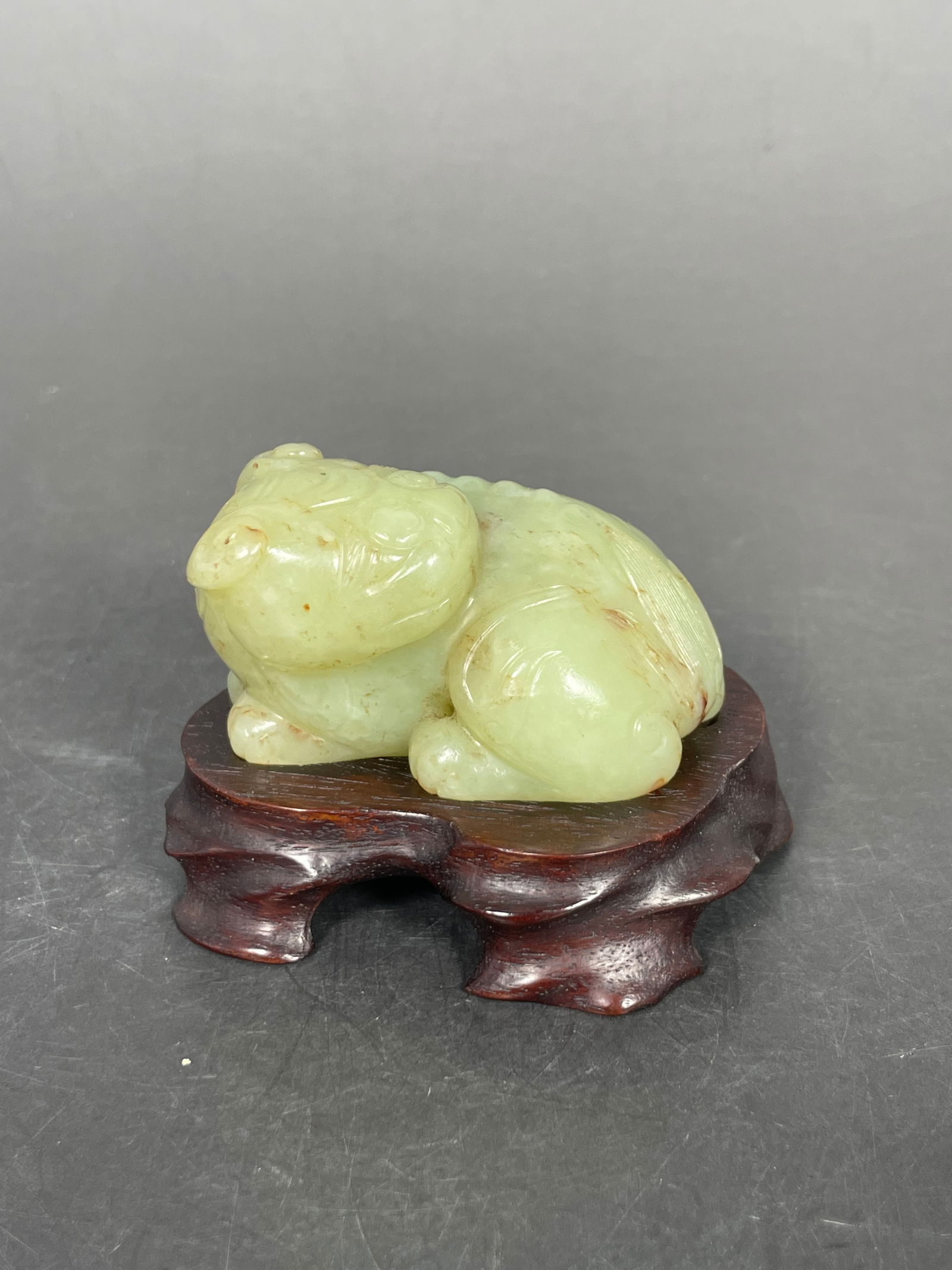 A Chinese Celadon Jade Carving of a Crouching Mythical Animal (1 of 9)