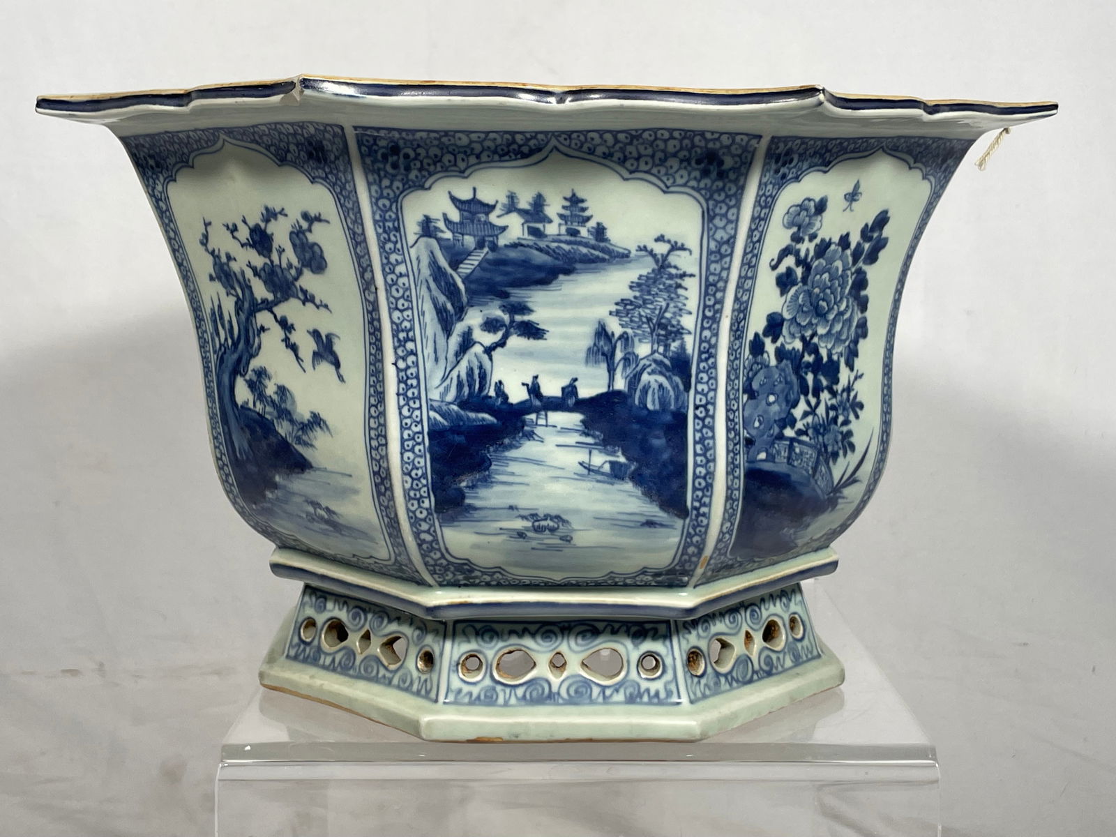 Christie's Tag and Sticker: A Chinese Blue and White 'Medallion' Hexagonal Jardiniere, Qing Dynasty: 9 in. high, 15.1/2 in. wide.