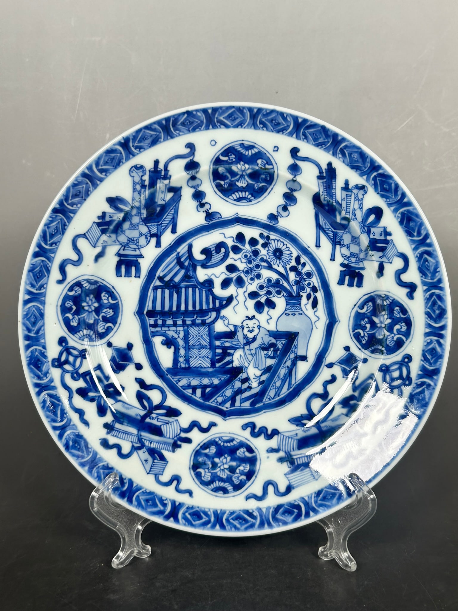 Christie's Sticker: A Chinese Blue and White 'Antiques' Dish, Kangxi Period, Qing Dynasty (1 of 7)