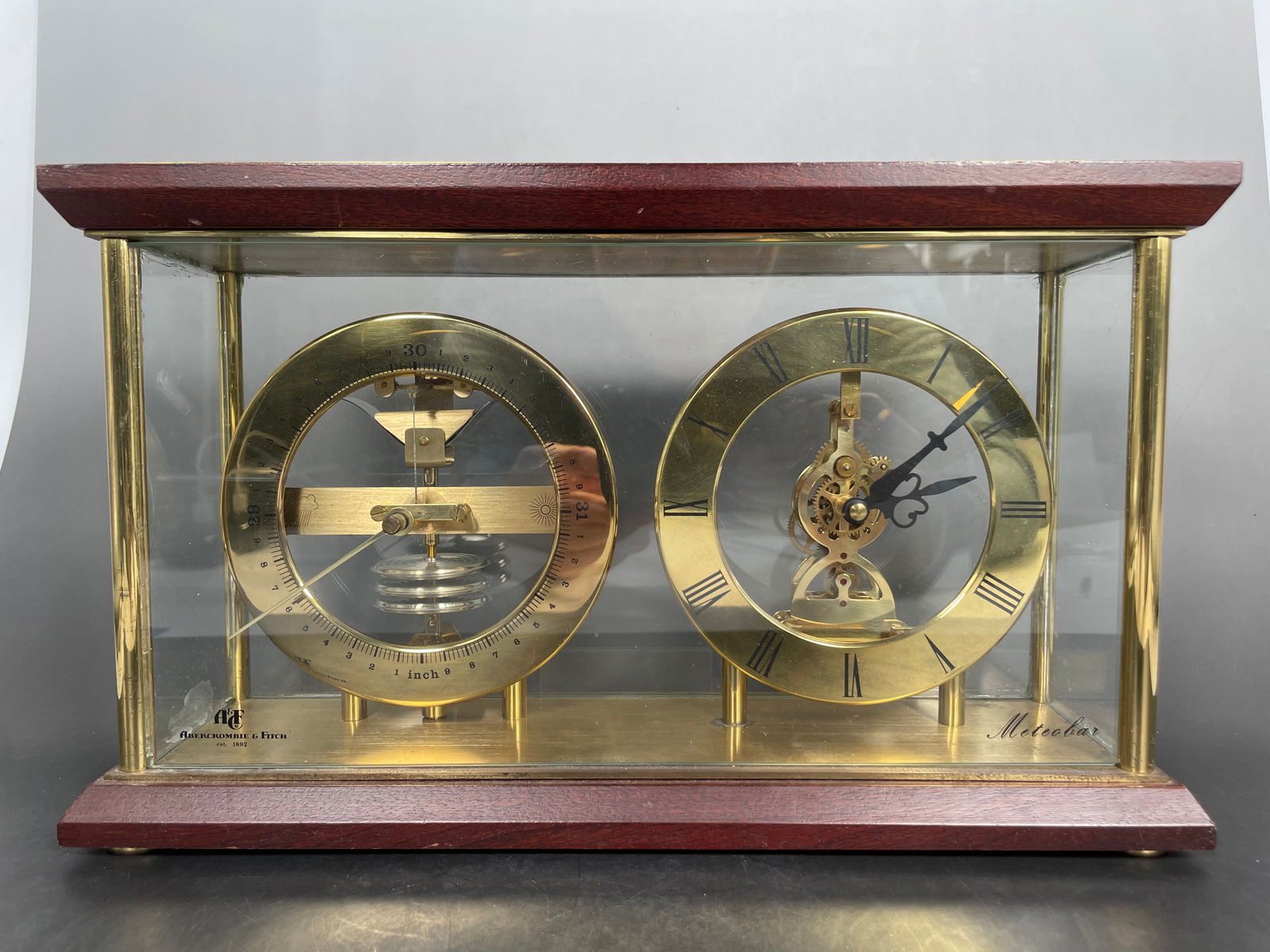 An Abercrombie & Fitch Clock and Barometer Set (1 of 15)