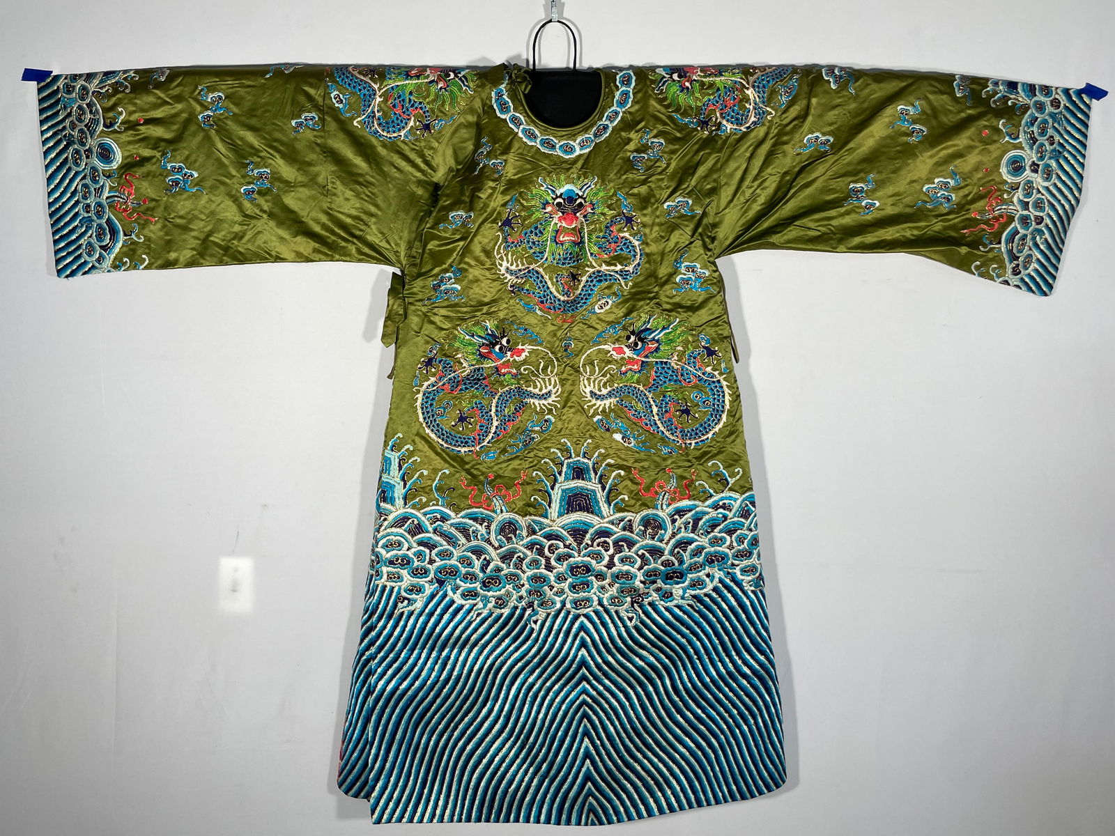 A Chinese Embroidered Silk Robe, Peking Opera Costume: 55 in. shoulder to hem, 26 in. pit to pit, and 34 in. shoulder to shoulder.