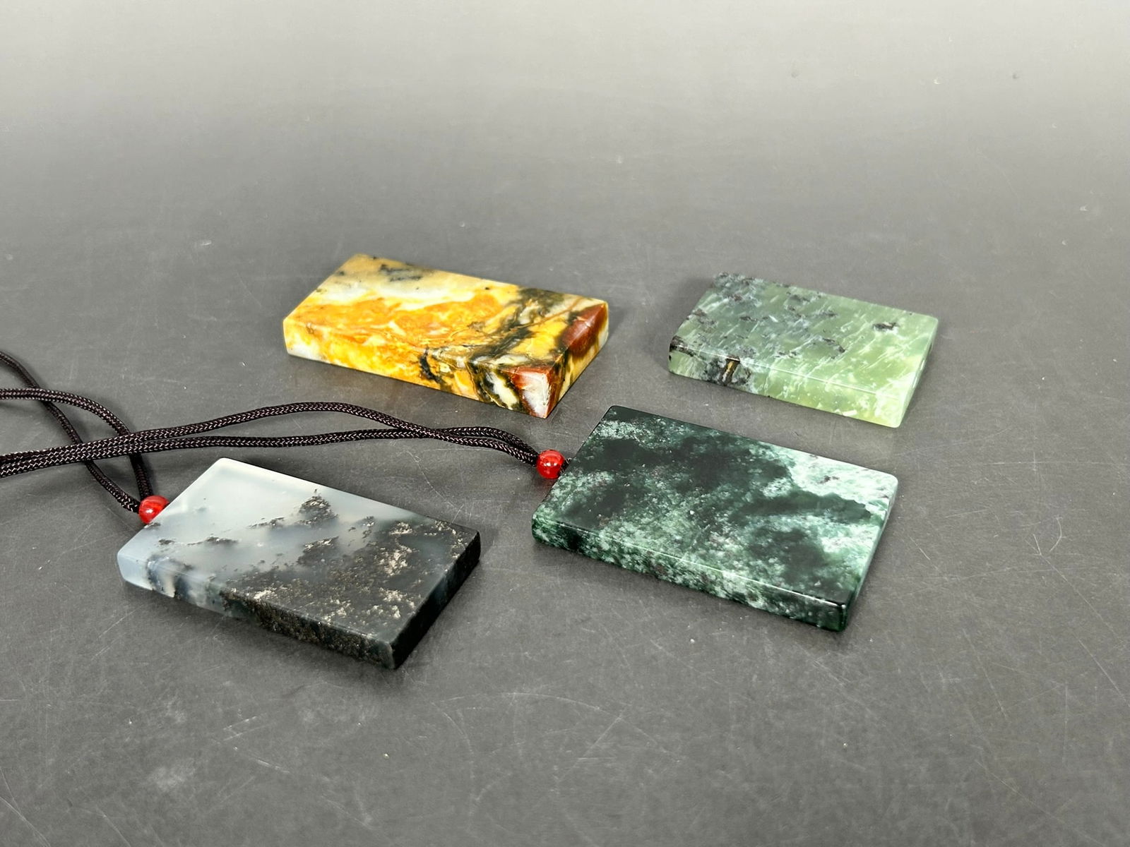 A Group of Four Rectangular Stone Plaques - 10