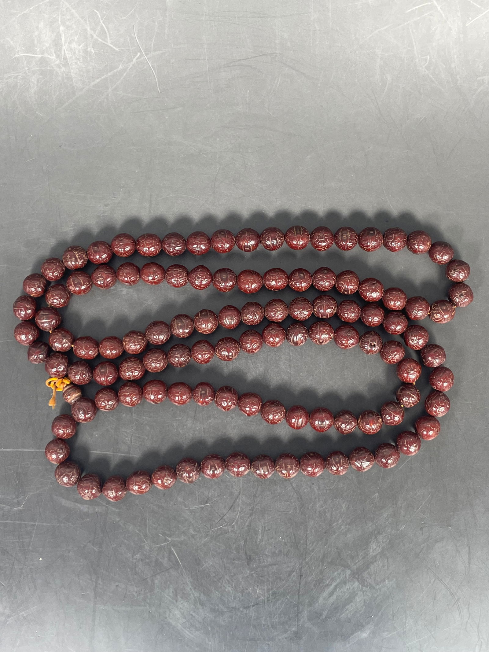 A String of Wood Beads, Necklace: The beads measures 1/2 in. each, the necklace measures 61 in. long overall.