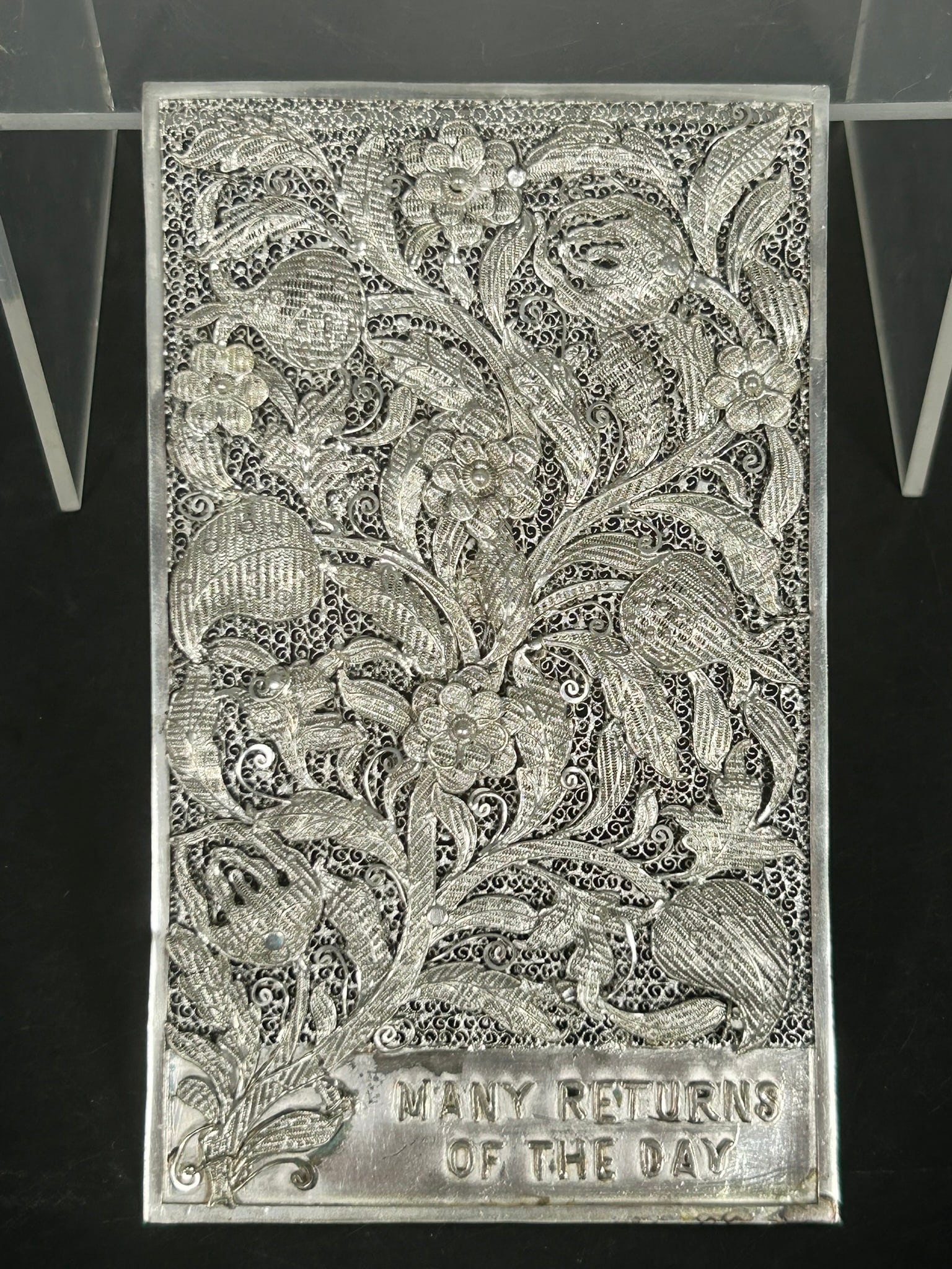A Silver Filigree Panel: Studio's mark to the center of the reverse side, 5.1/4 in. x 3.1/8 in.