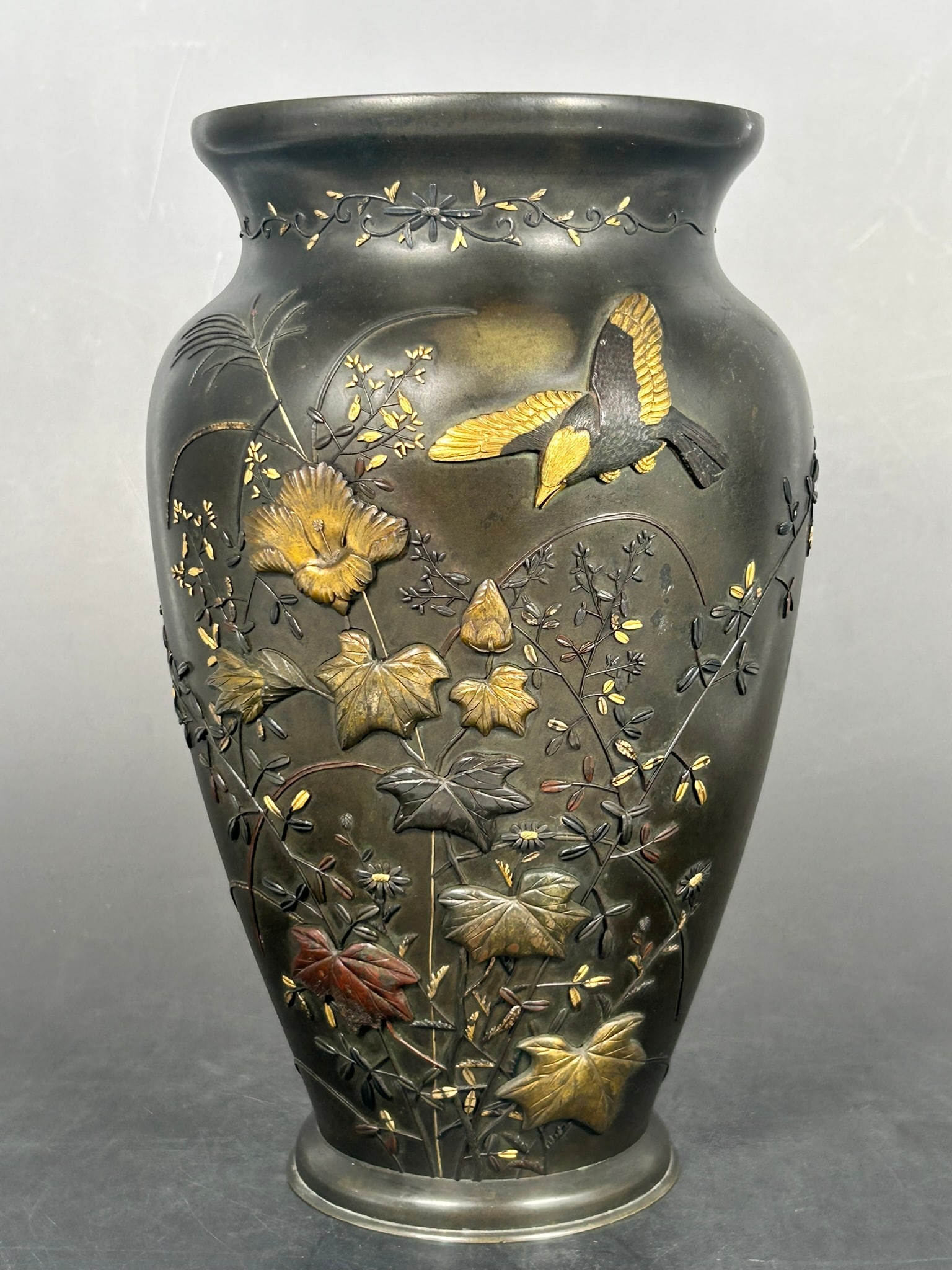 A Japanese Mixed Metal Bronze Vase: 10.1/4 in. high, 6.1/4 in. wide.