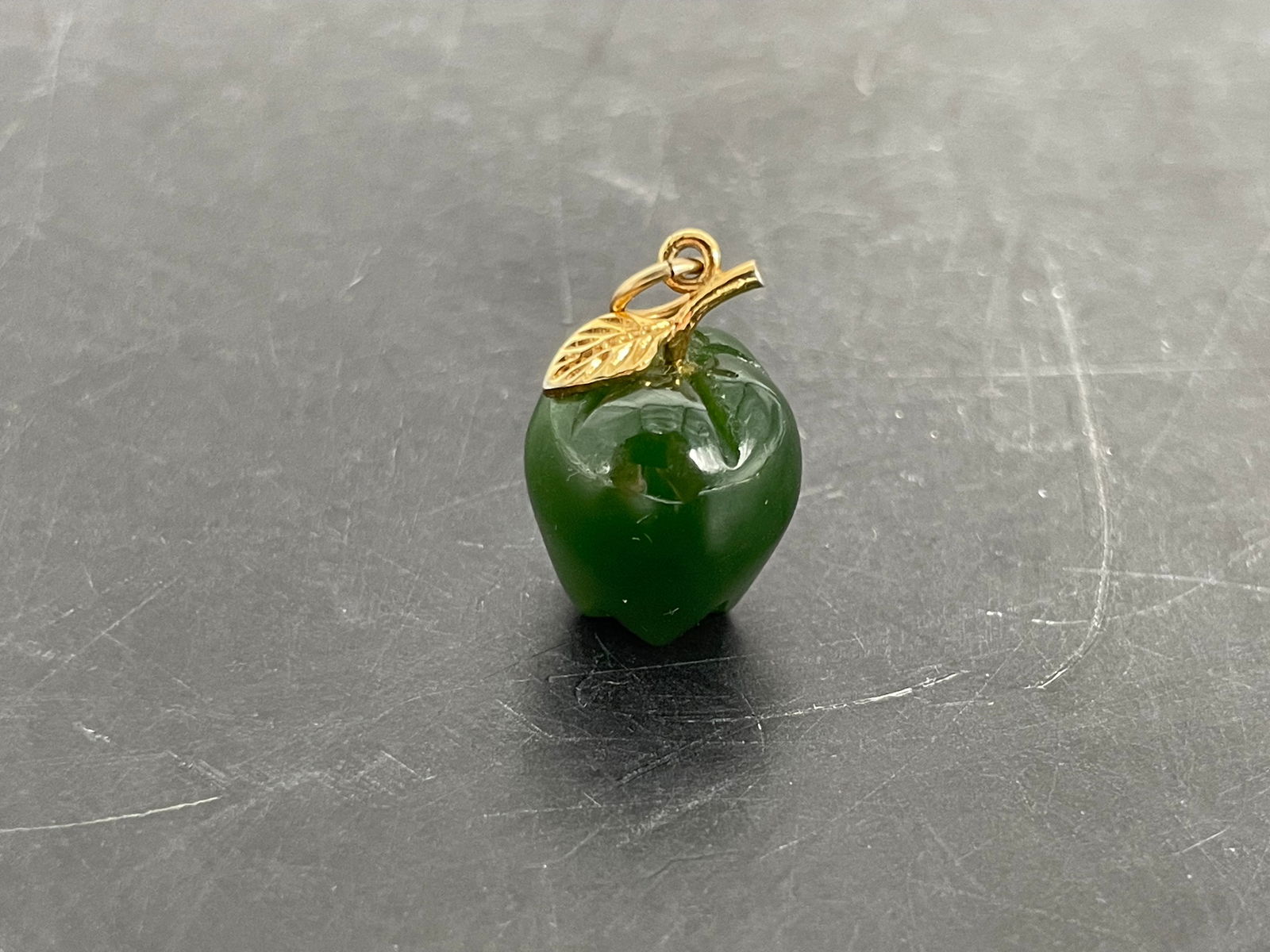 A Carved Spinach-Jadeite Pendant in the form of Apple (1 of 15)