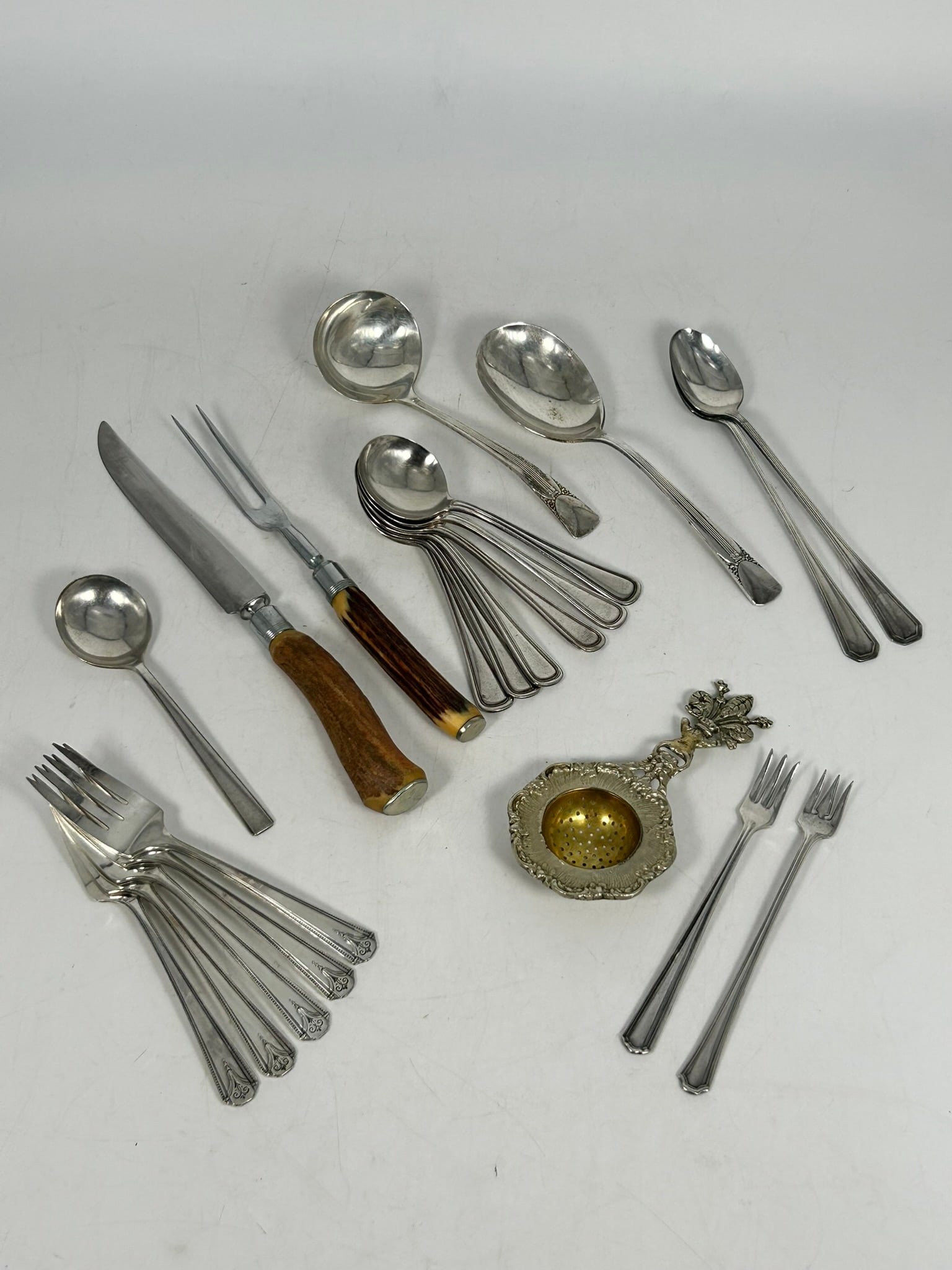 A Set of Twenty-One Flatware (1 of 19)