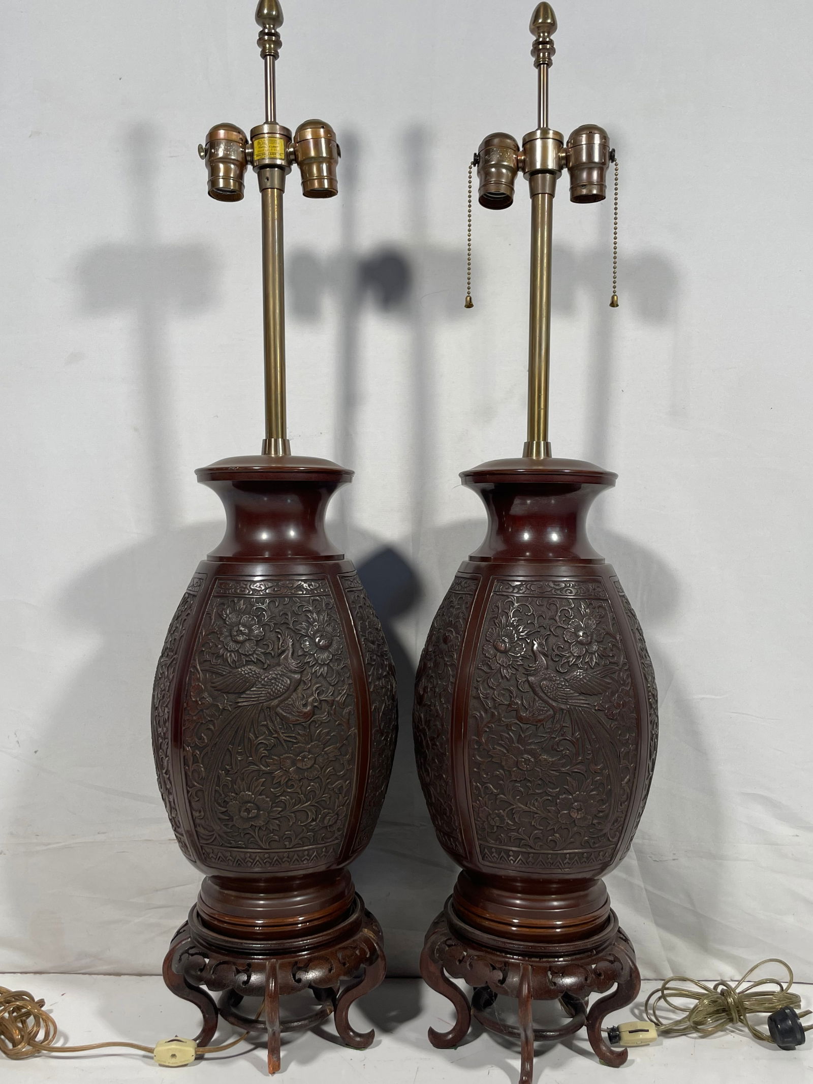 A Pair of Japanese Bronze Lamp: 16 in. high, 8 in. wide for the vases each; 36 in. high, 8 in. wide overall each. Provenance: Kaminski Auctions; Mrs Henry Ford II, Day 2 Furnishings, 10 April 2021, lot 723.