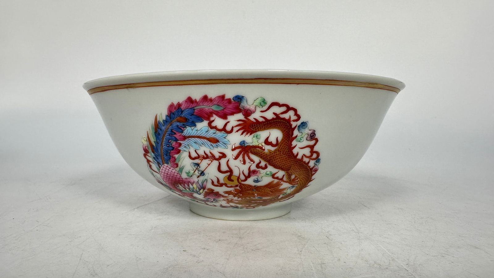 A Chinese Famille-Rose Dragon and Phoenix Bowl, Qing Dynasty (1 of 9)