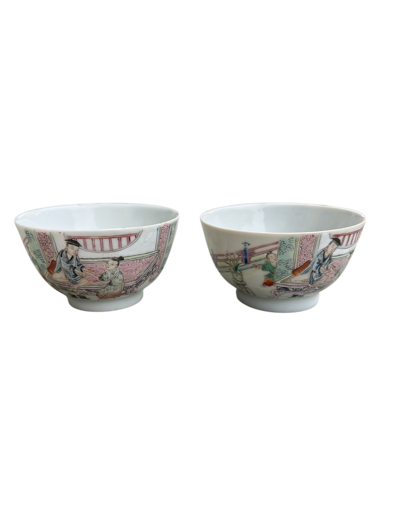 A Pair of Chinese Famille Rose Figural Bowls, Qing Dynasty: Pair of Chinese Qing Dynasty famille rose bowls decorated with figural scenes.Diameter: 3 inches; height: 2 3/4 inches.Condition: good.