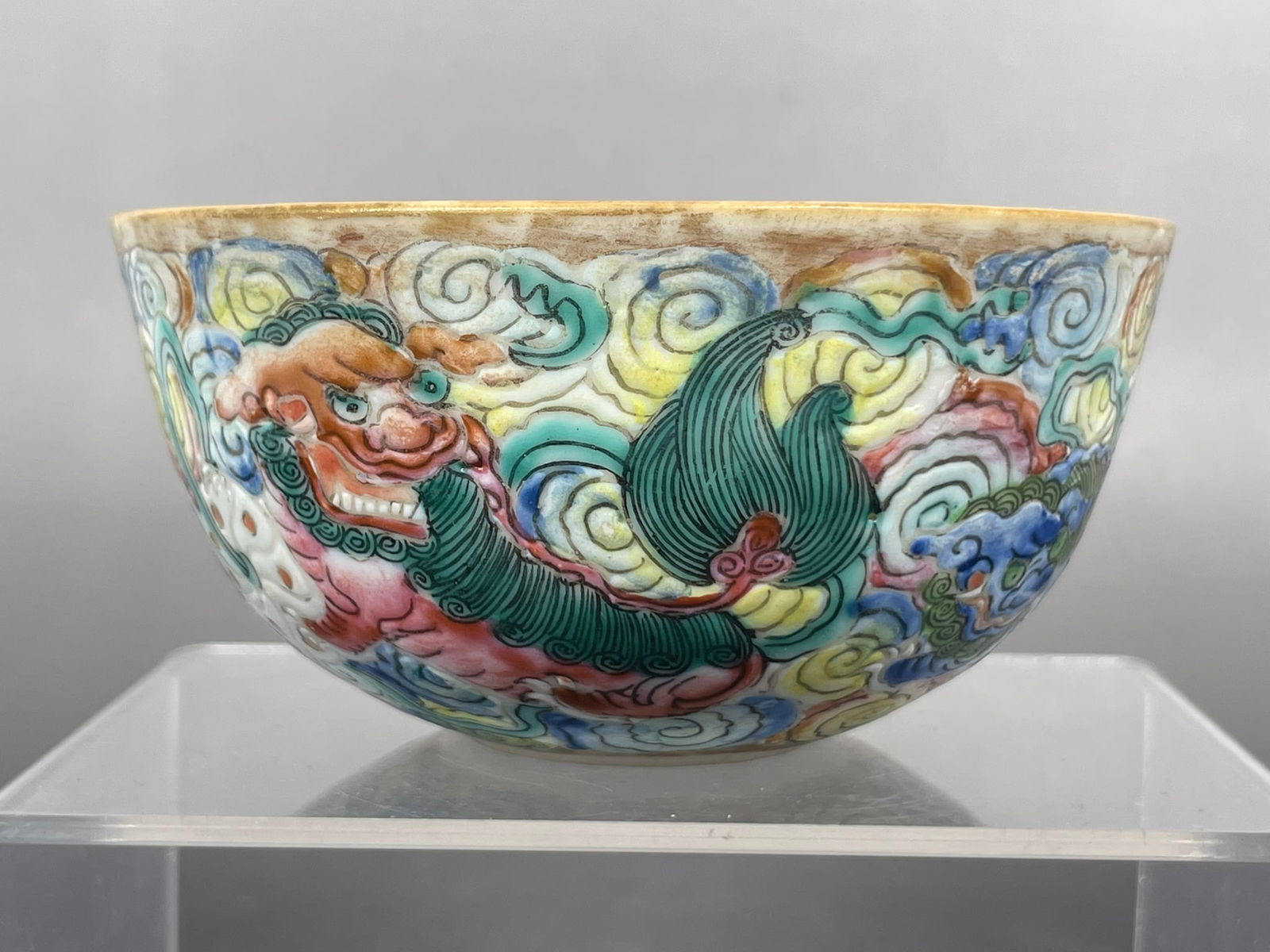 A Chinese Famille Rose Porcelain 'Buddhist Lions' Bowl, Tongzhi Mark, Qing Dynasty: 2 in. high, 4.1/8 in. diam. Property of a Private Maryland Collector.