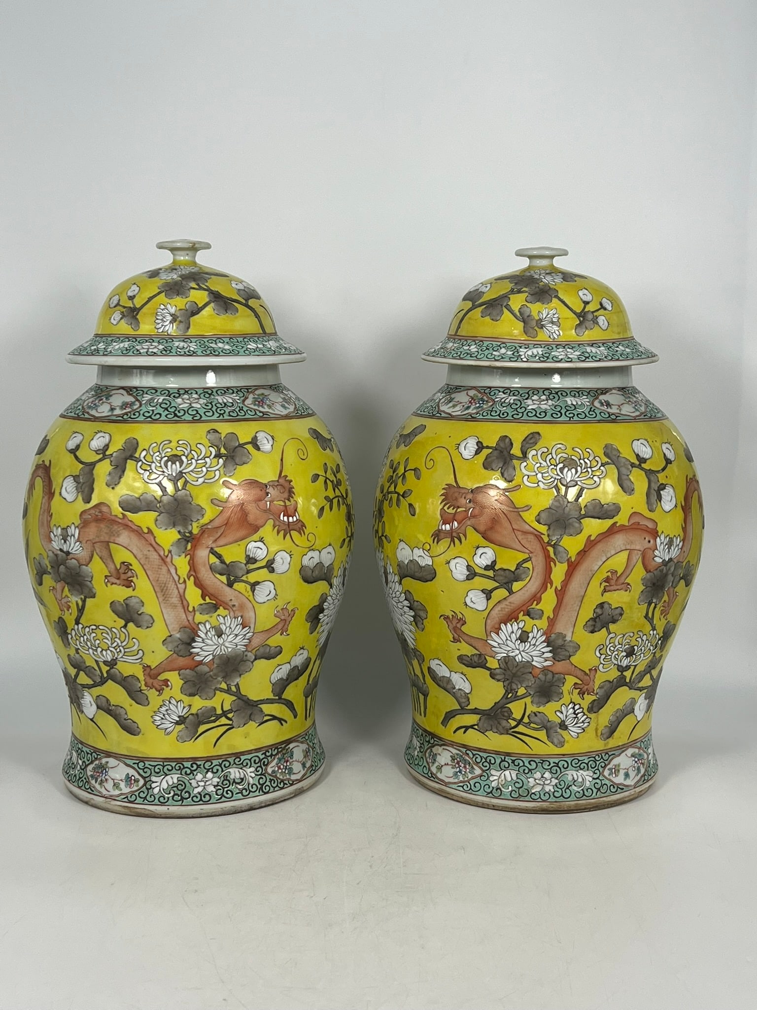 A Pair of Chinese Famille Rose Yellow-Ground 'Dragon' Porcelain Jars and Covers, Qing Dynasty (1 of 20)