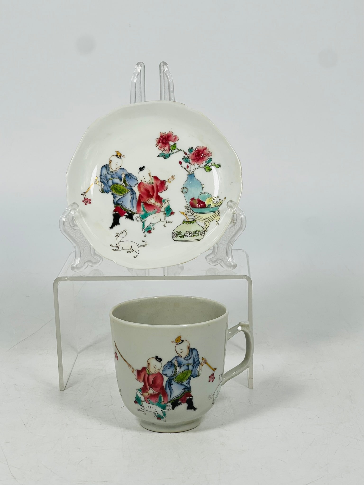 A Set of Chinese Famille Rose Teacup and Saucer, 18th Century: The Saucer: D 64 1/2 inches, Teacup, D 3 1/2 inches, H 2 3/4 inches.Property of a Private New England Collector.